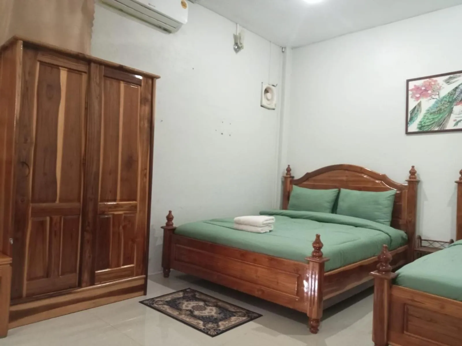 Bed in Erawan Guesthouse