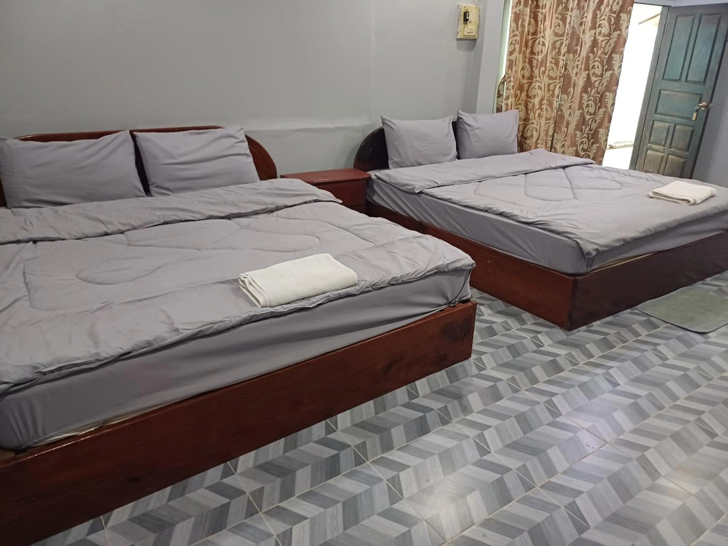 Bed in Erawan Guesthouse