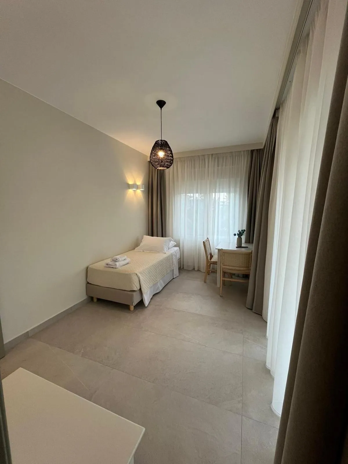 Photo of the whole room, Bed in Mediterranean Sea Top Floor