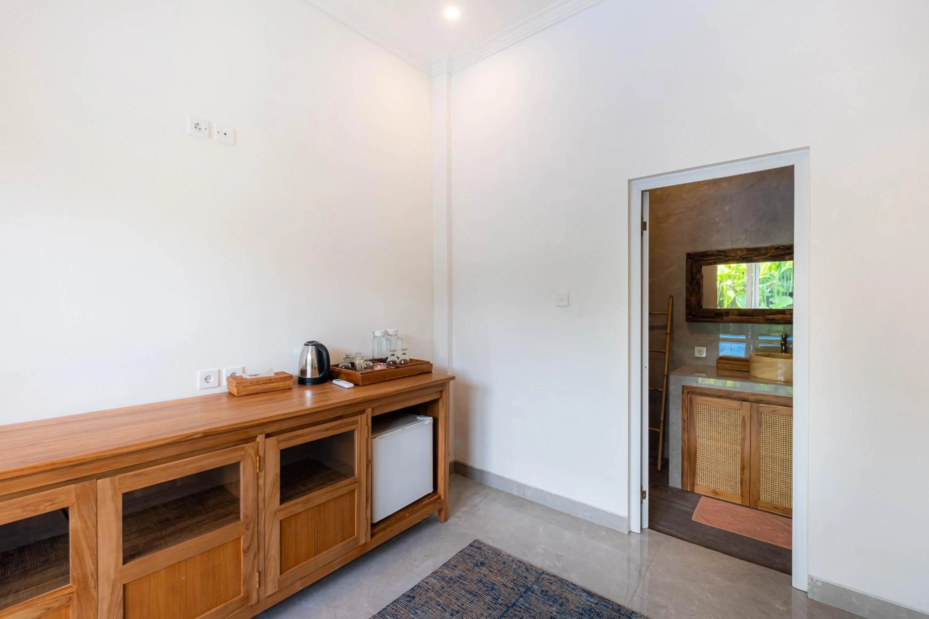 Kitchen or kitchenette in Kubu Kirana by Supala