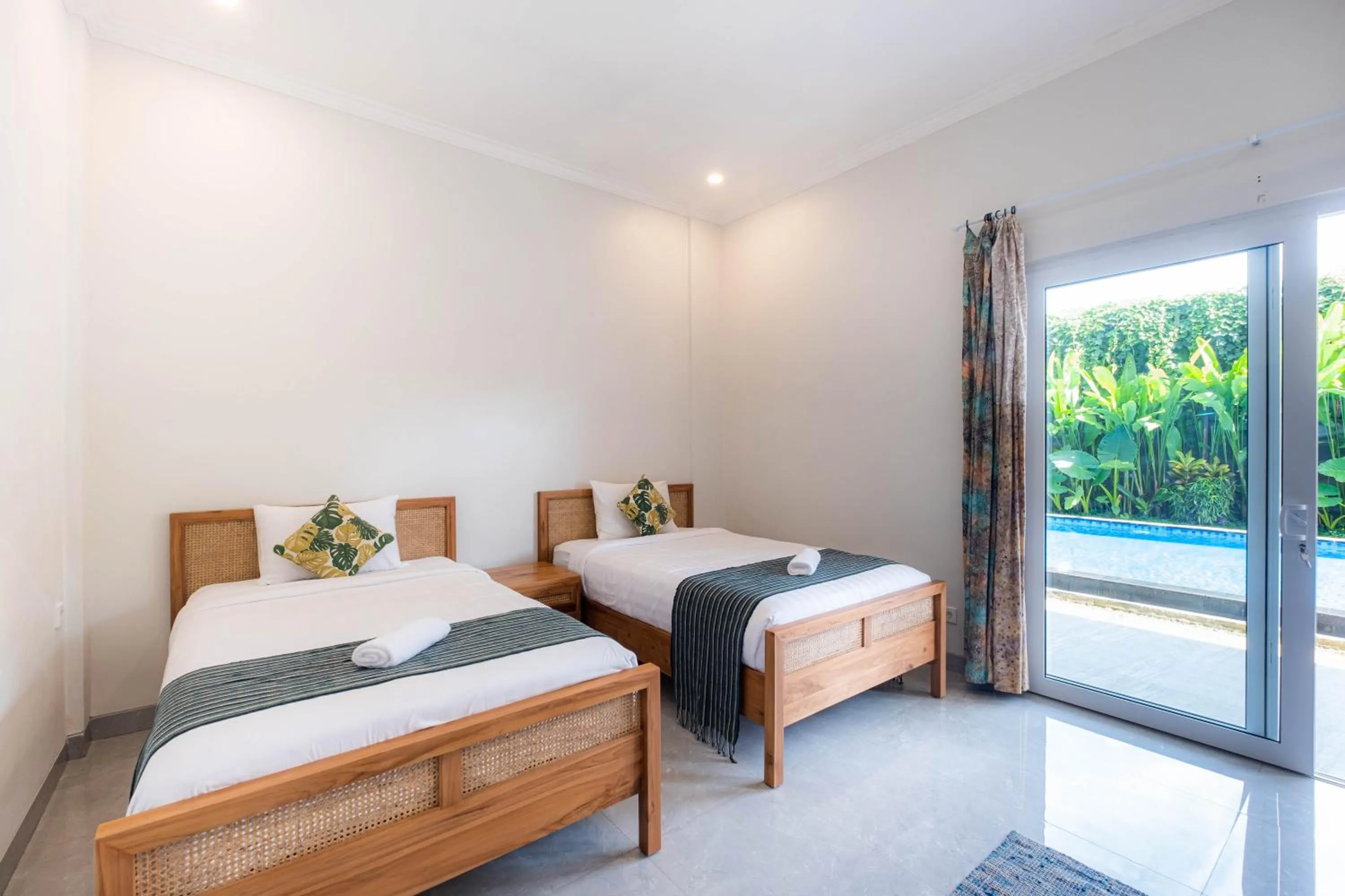 Photo of the whole room, Bed in Kubu Kirana by Supala