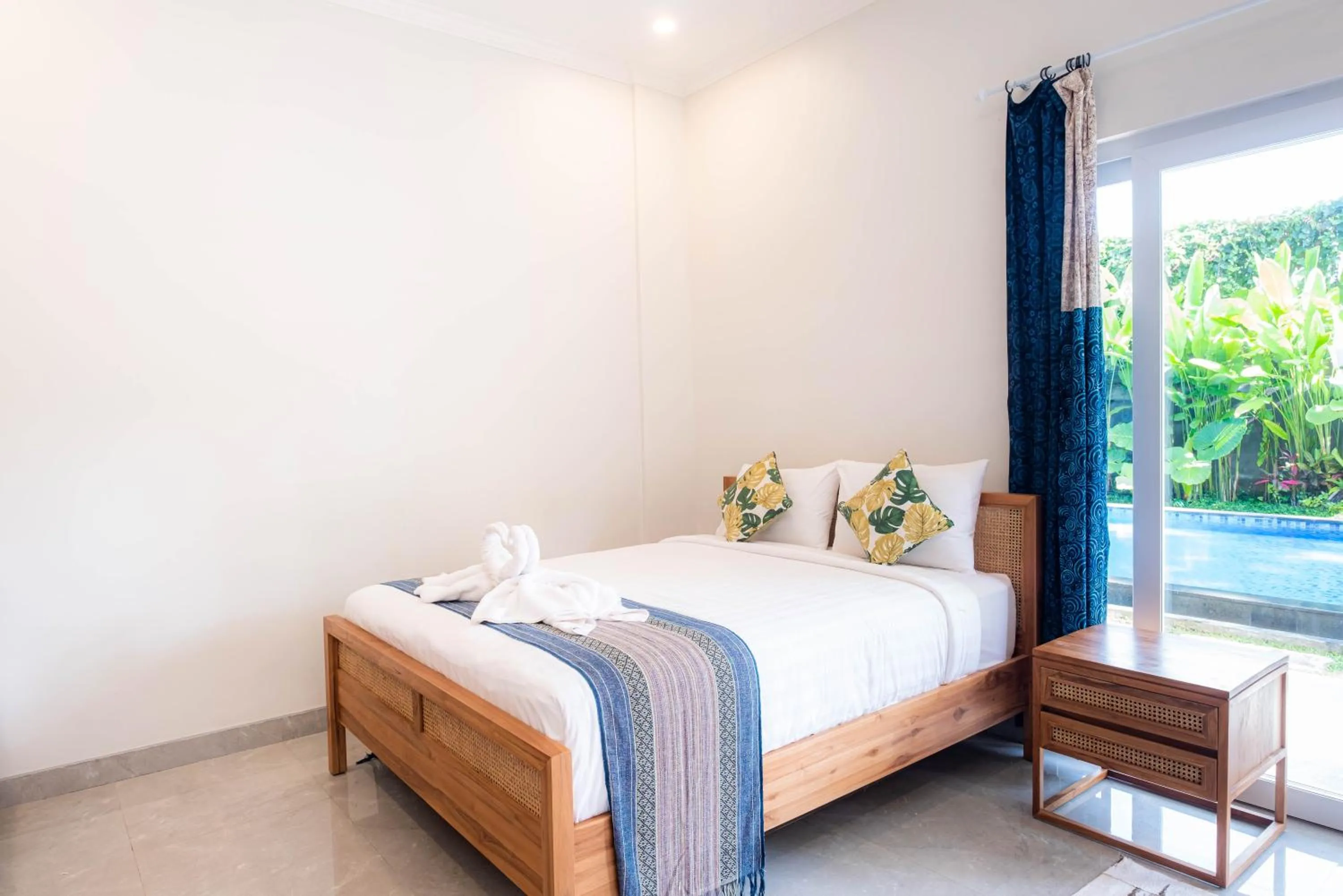 Photo of the whole room, Bed in Kubu Kirana by Supala