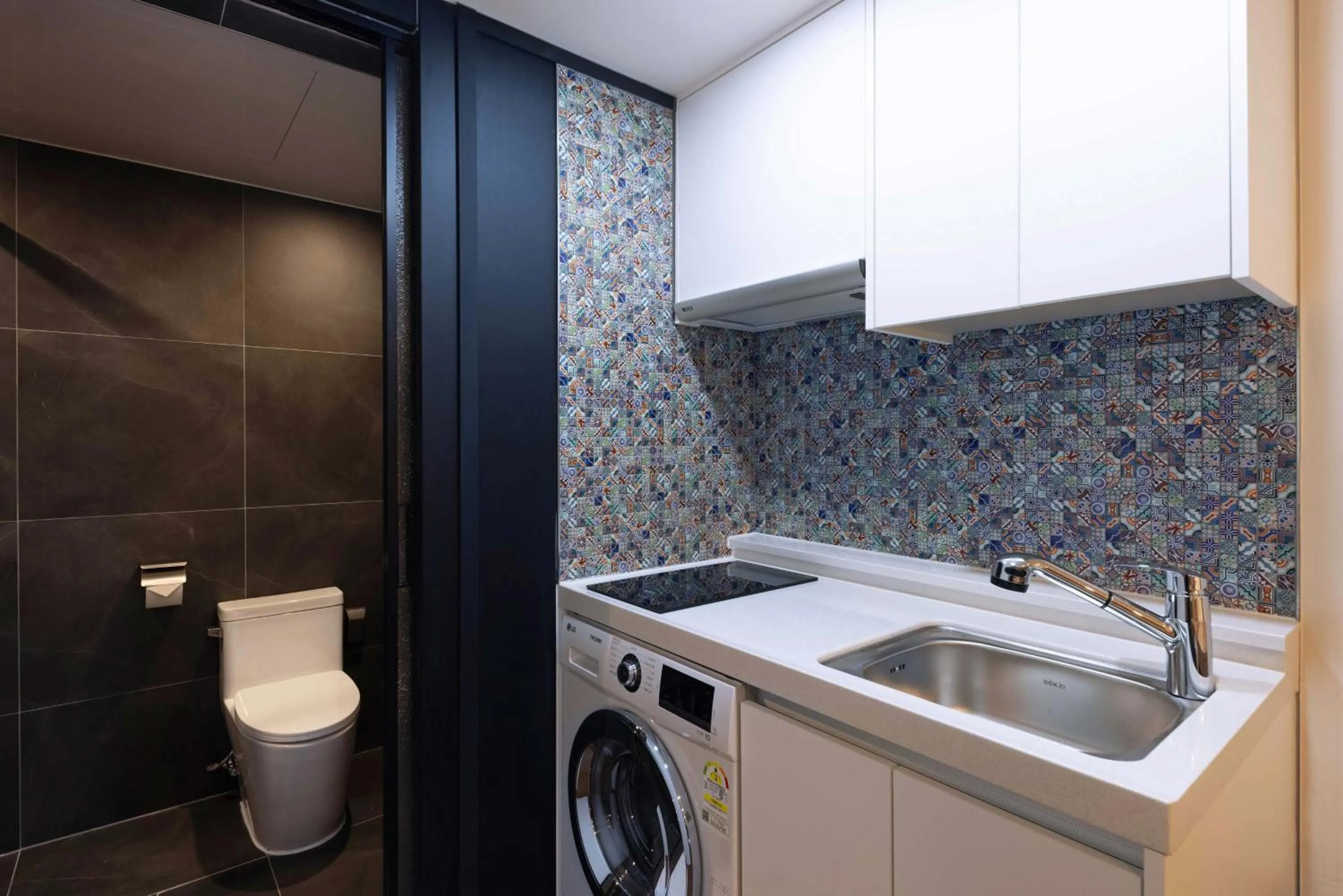 Kitchen or kitchenette in ARA Hotel