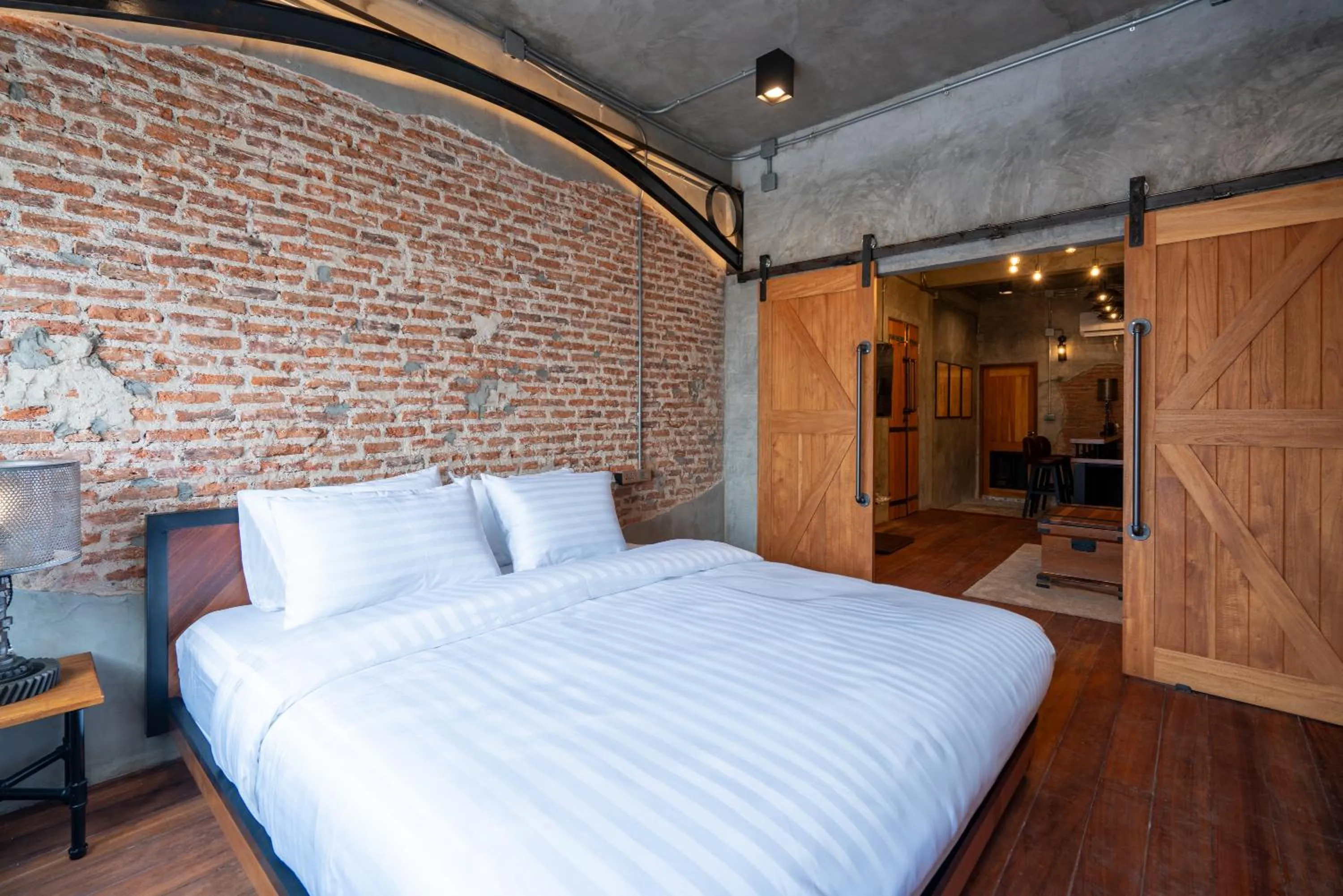 Bed in House of Machine Boutique Hotel