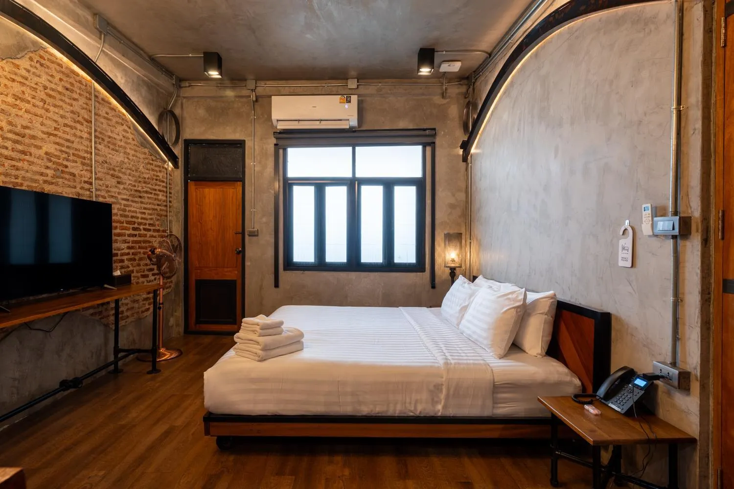 Bed in House of Machine Boutique Hotel