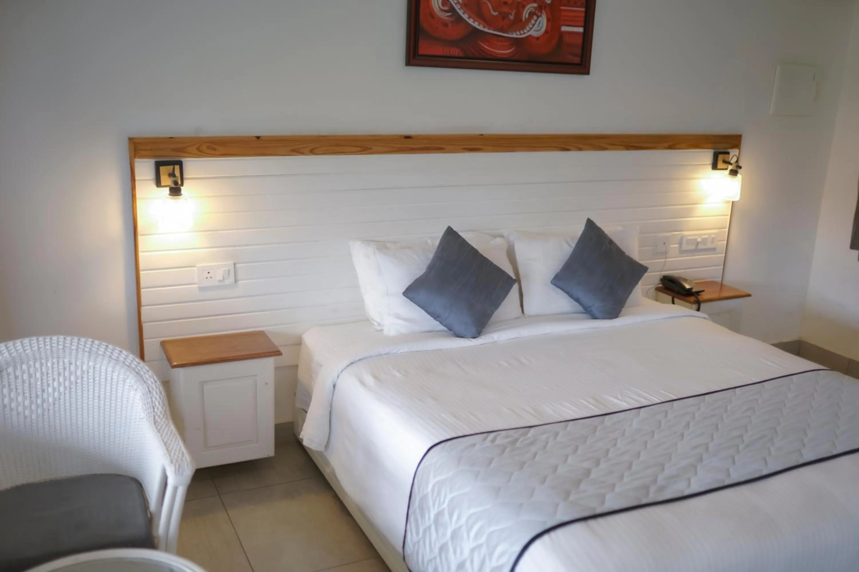 Bed in PEKOE Plantation Cottages by LexStays