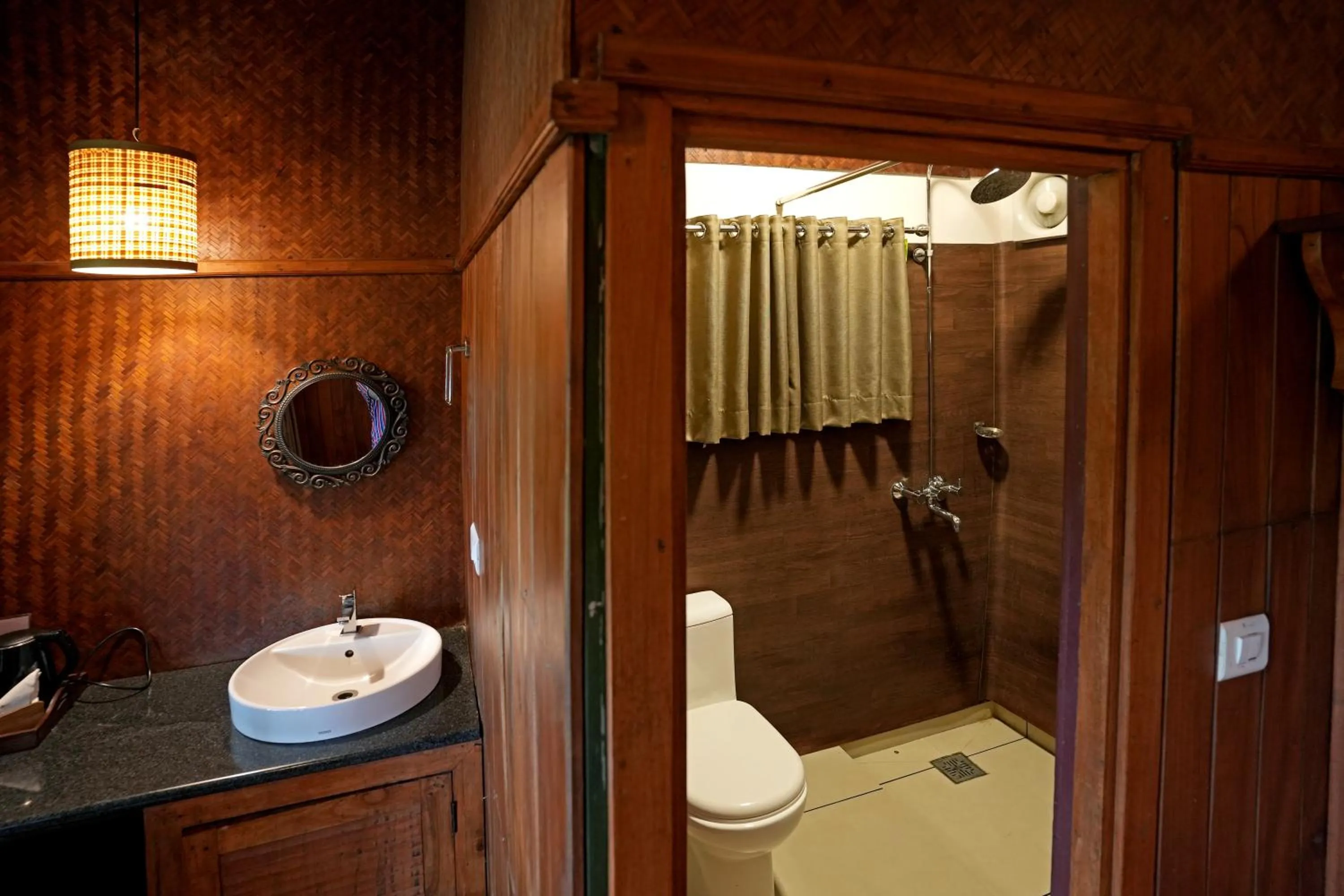 Toilet in Coffee Acres Resort