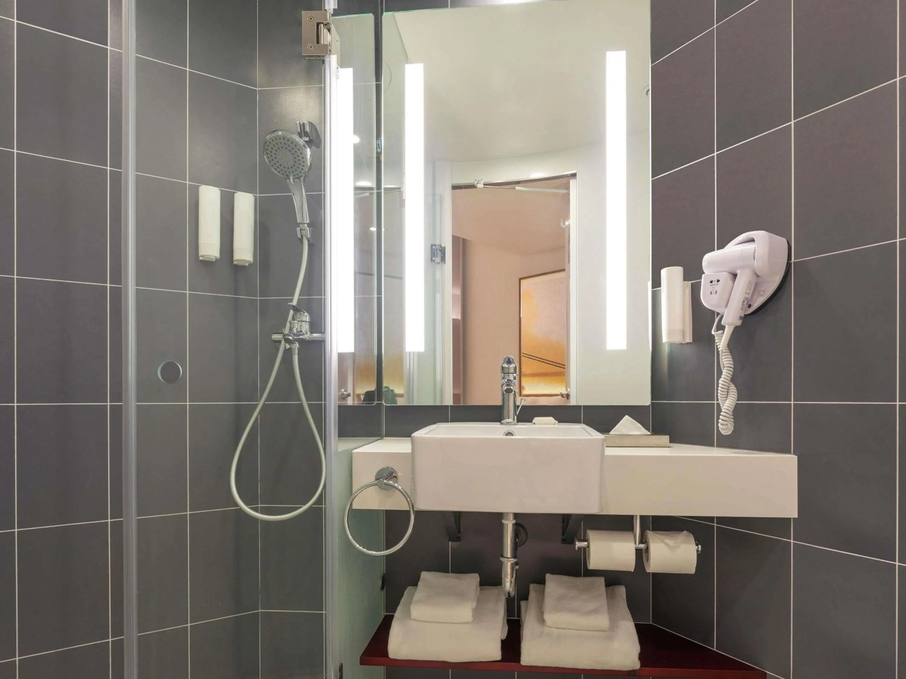 Bedroom in ibis Thane - An Accor Brand