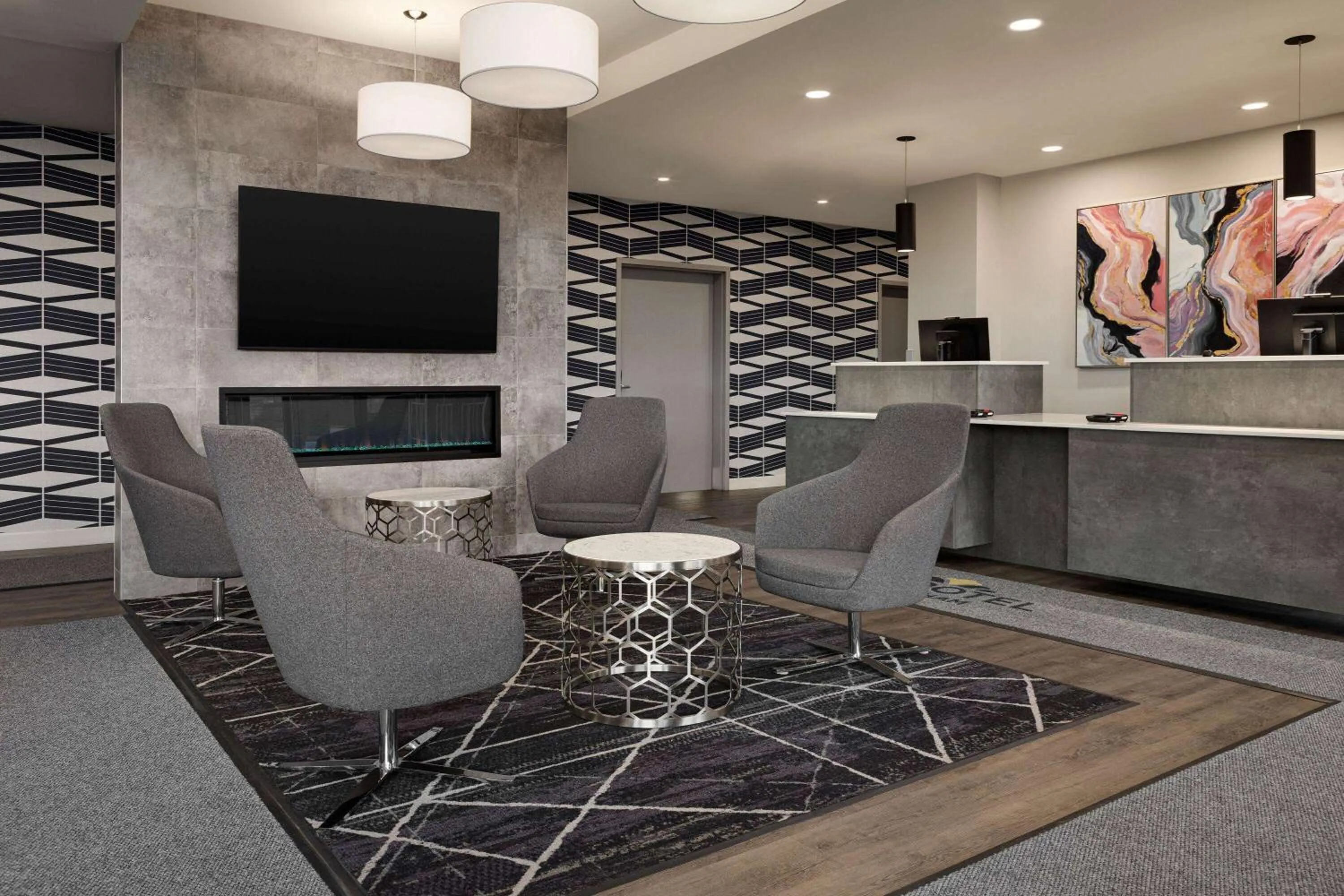 Lobby or reception in Microtel Inn & Suites by Wyndham Boisbriand