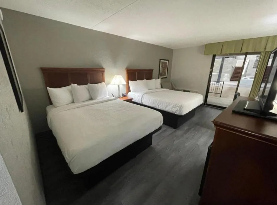 Bed in Pine Lake Resort and Banquets