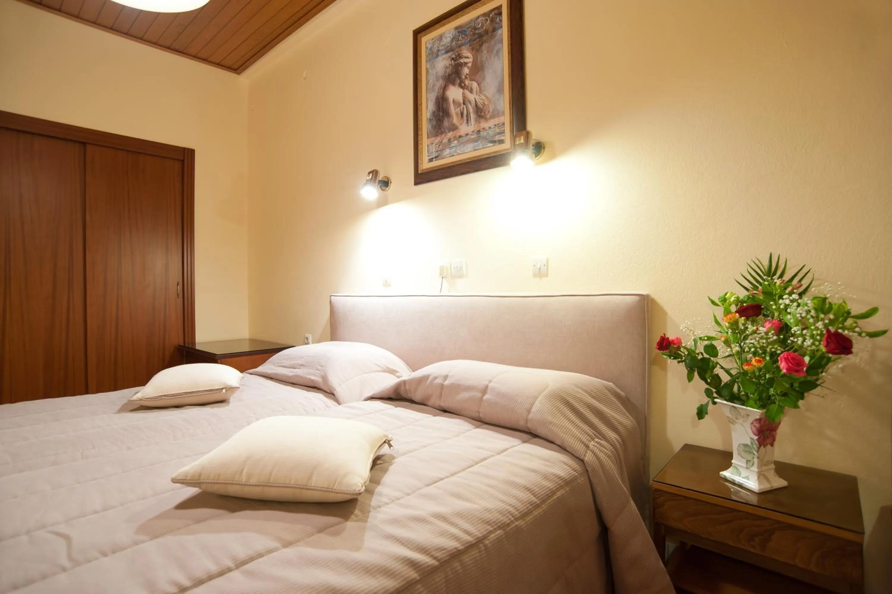 Bed in Hermes Delphi Hotel