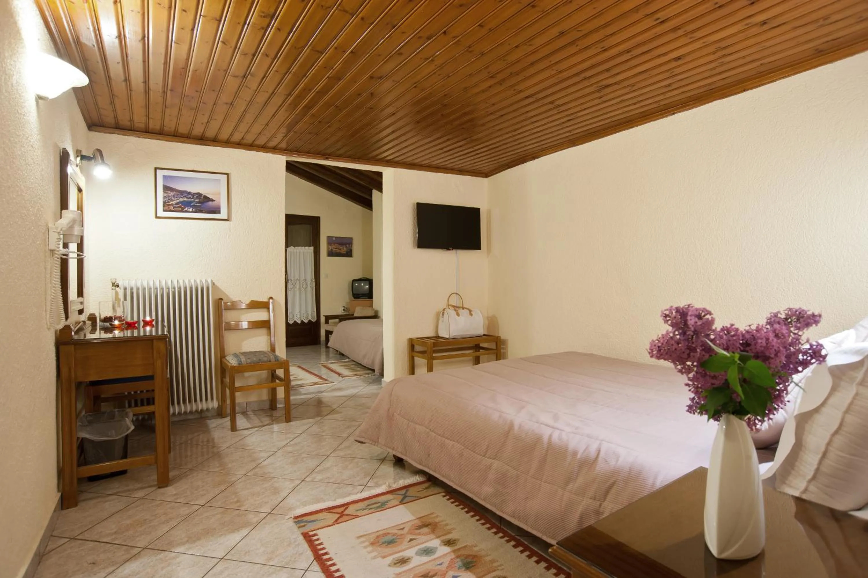 Bed in Hermes Delphi Hotel