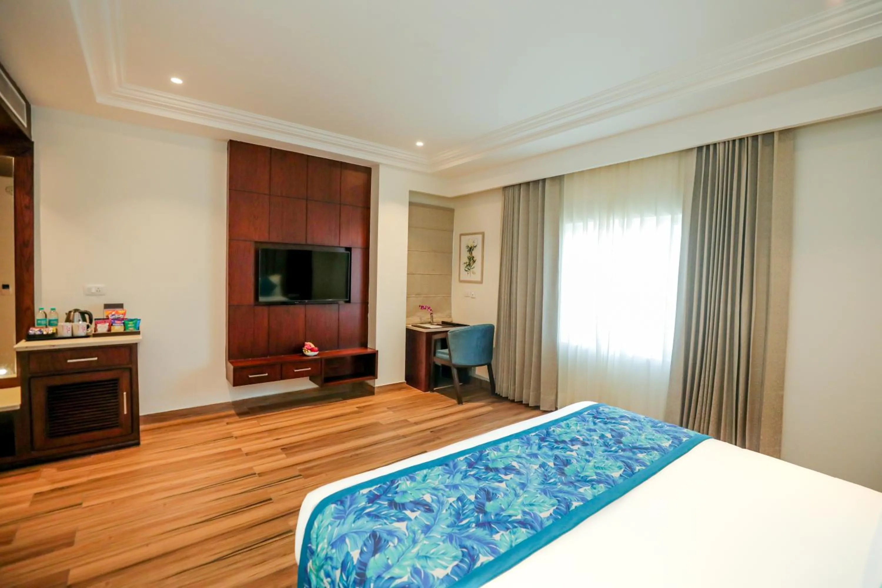 Photo of the whole room, Bed in Regenta Place Phagwara by Royal Orchid Hotels Limited