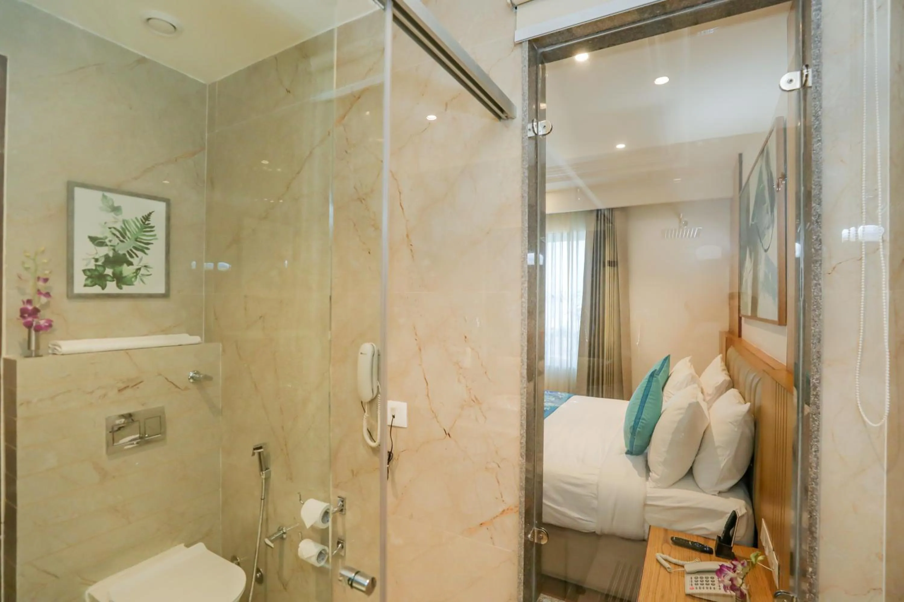 Bathroom in Regenta Place Phagwara by Royal Orchid Hotels Limited