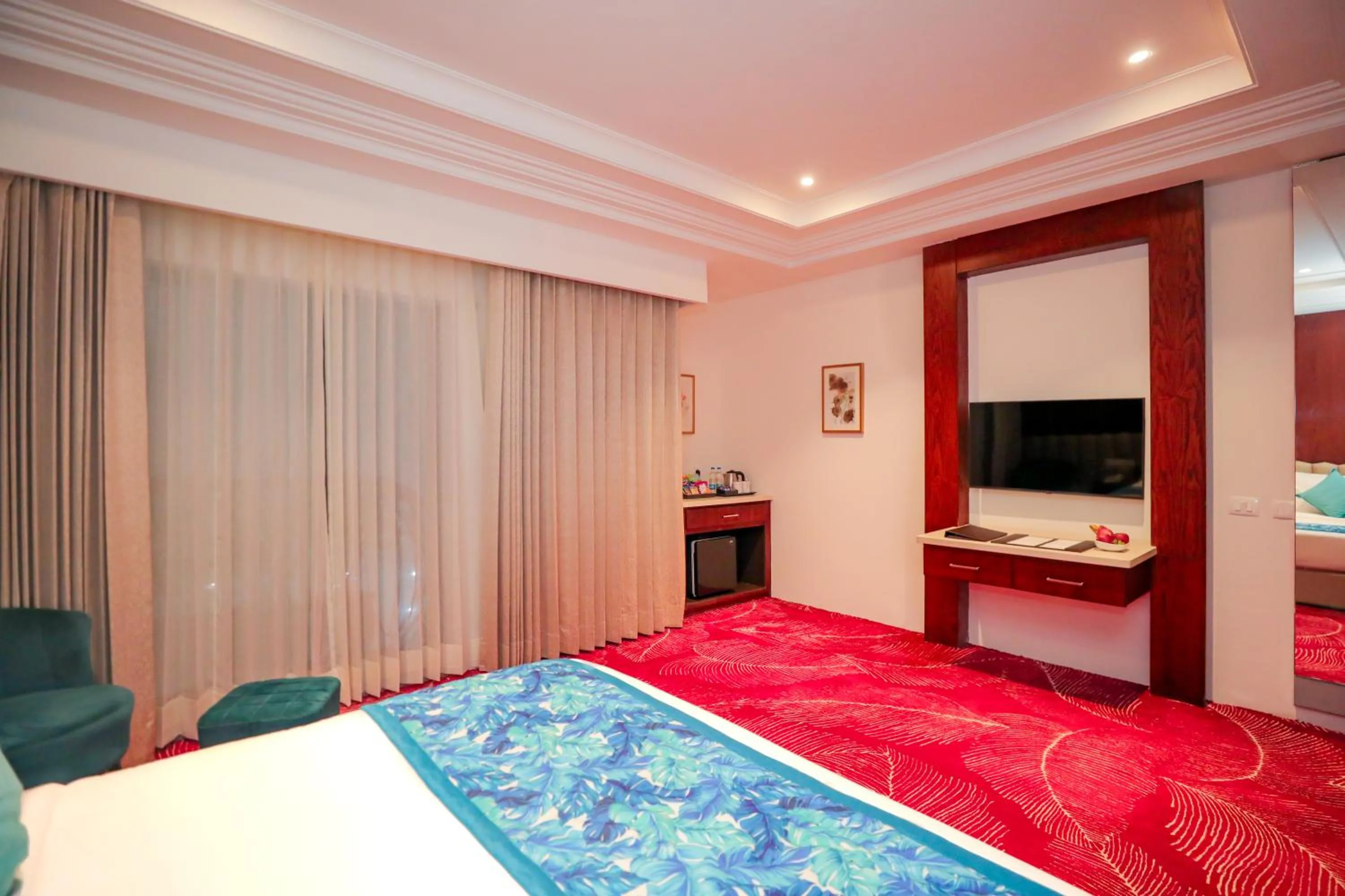 TV and multimedia, Bed in Regenta Place Phagwara by Royal Orchid Hotels Limited