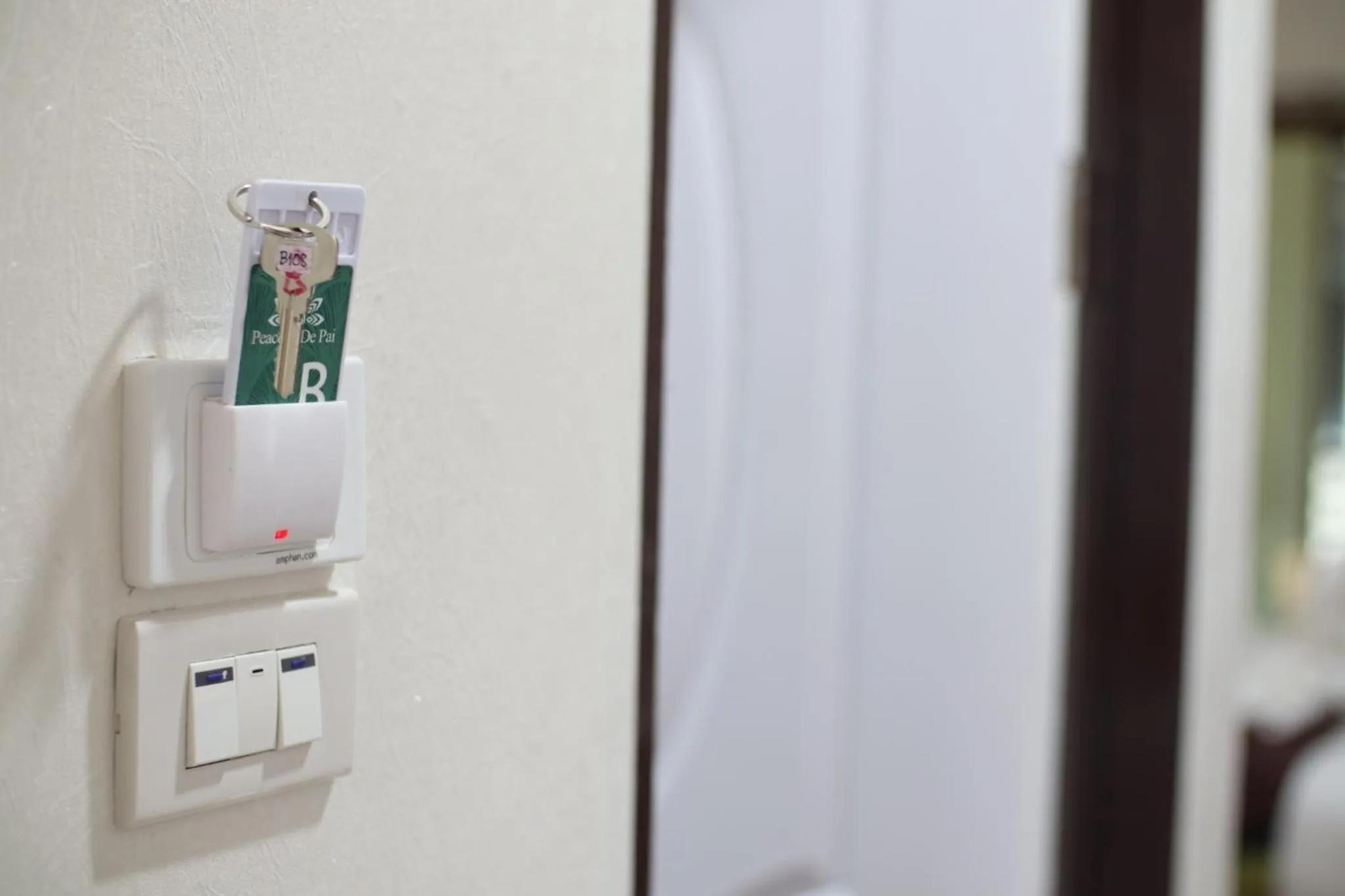 Property logo or sign in Peacock De Pai Hotel