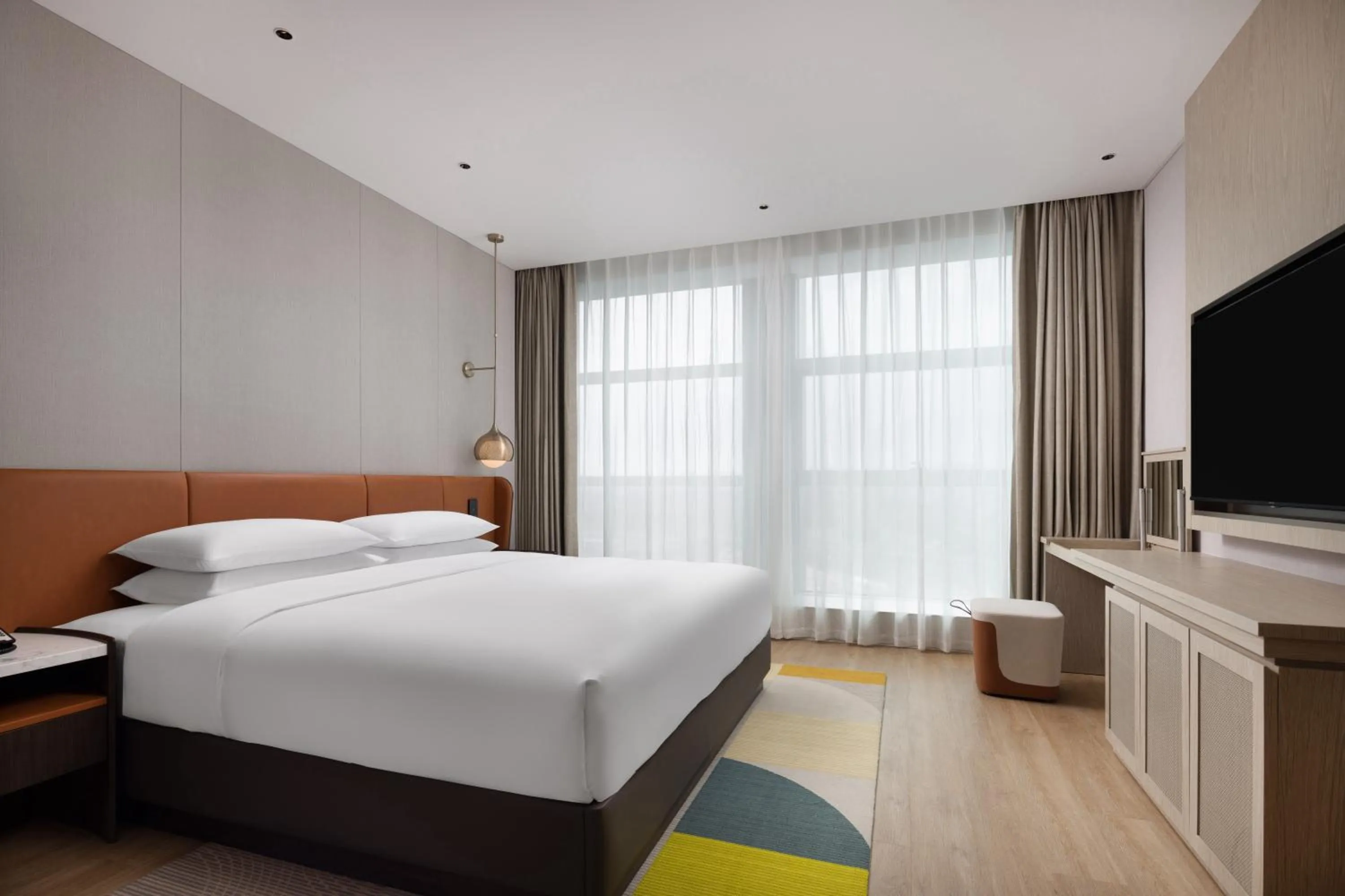 Communal lounge/ TV room, Bed in Home2 Suites by Hilton Guiyang Nanming Jiyuan