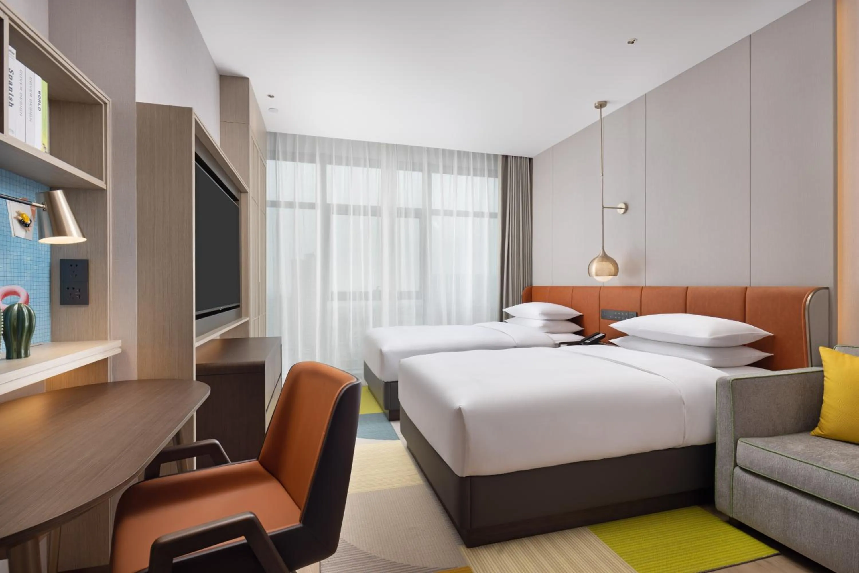 Communal lounge/ TV room, Bed in Home2 Suites By Hilton Foshan Jiujiang