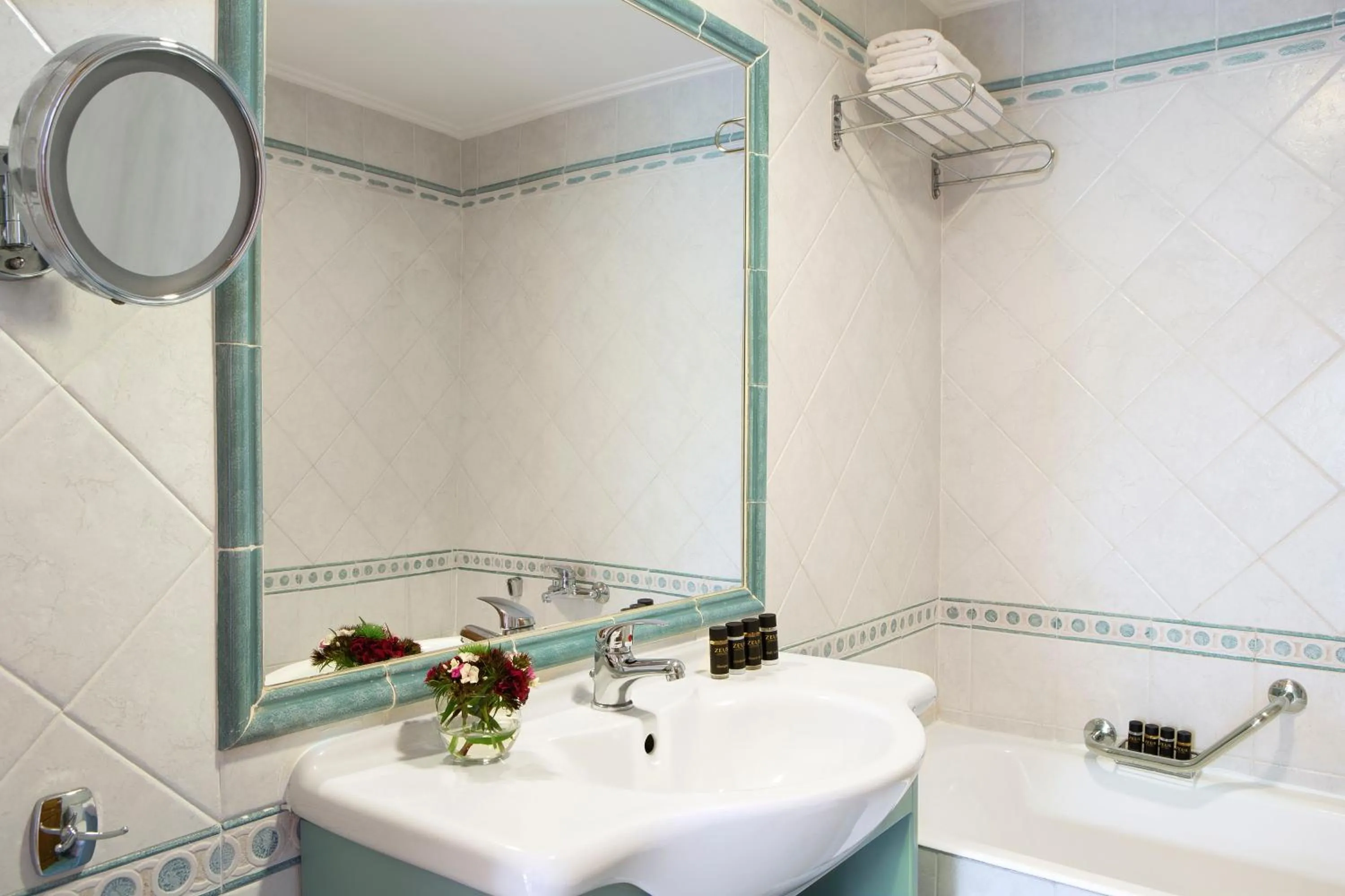 Bathroom in Zeus Essence Ramada by Wyndham Athens