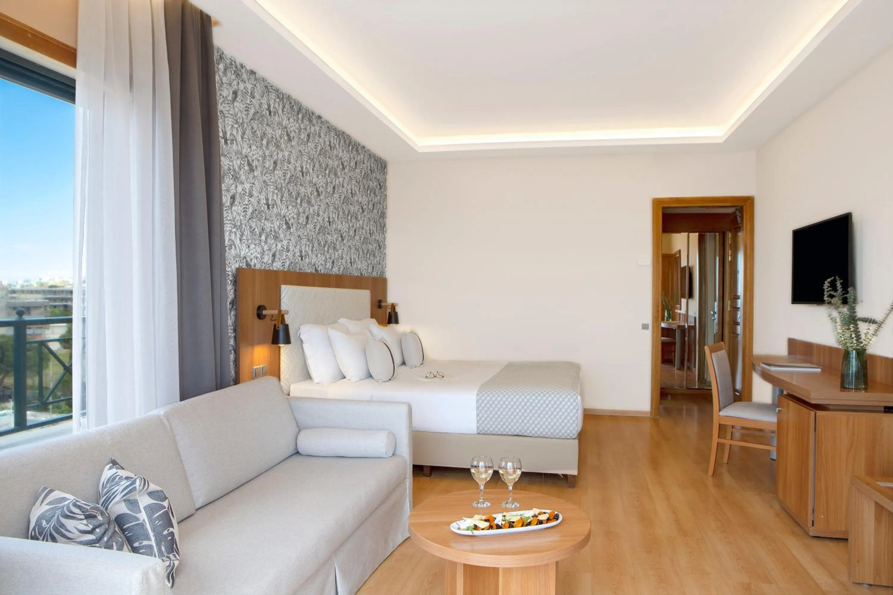 Bed in Zeus Essence Ramada by Wyndham Athens