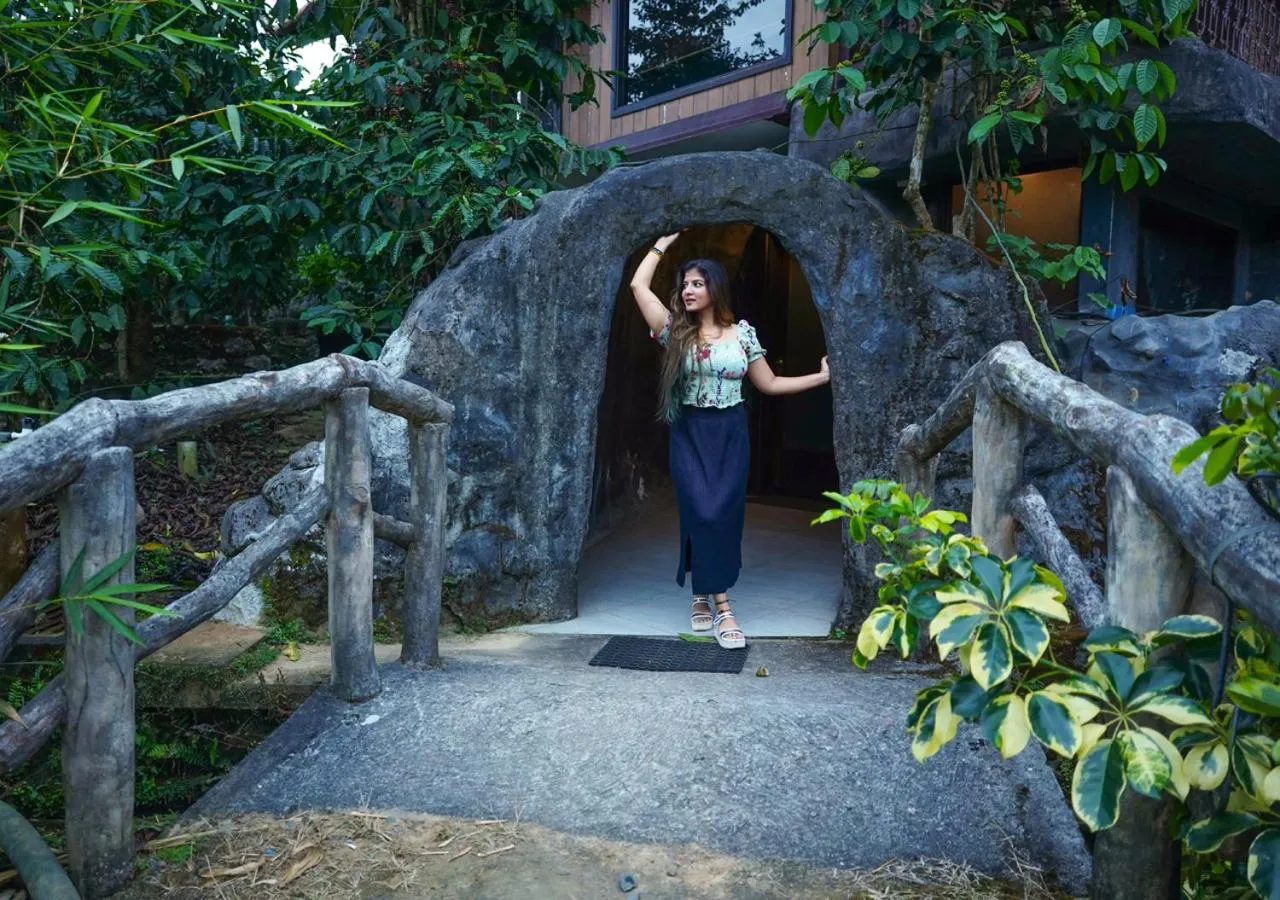 People in Niyatma Wayanad Pool Resort by VOYE HOMES - Inside Coffee Plantation