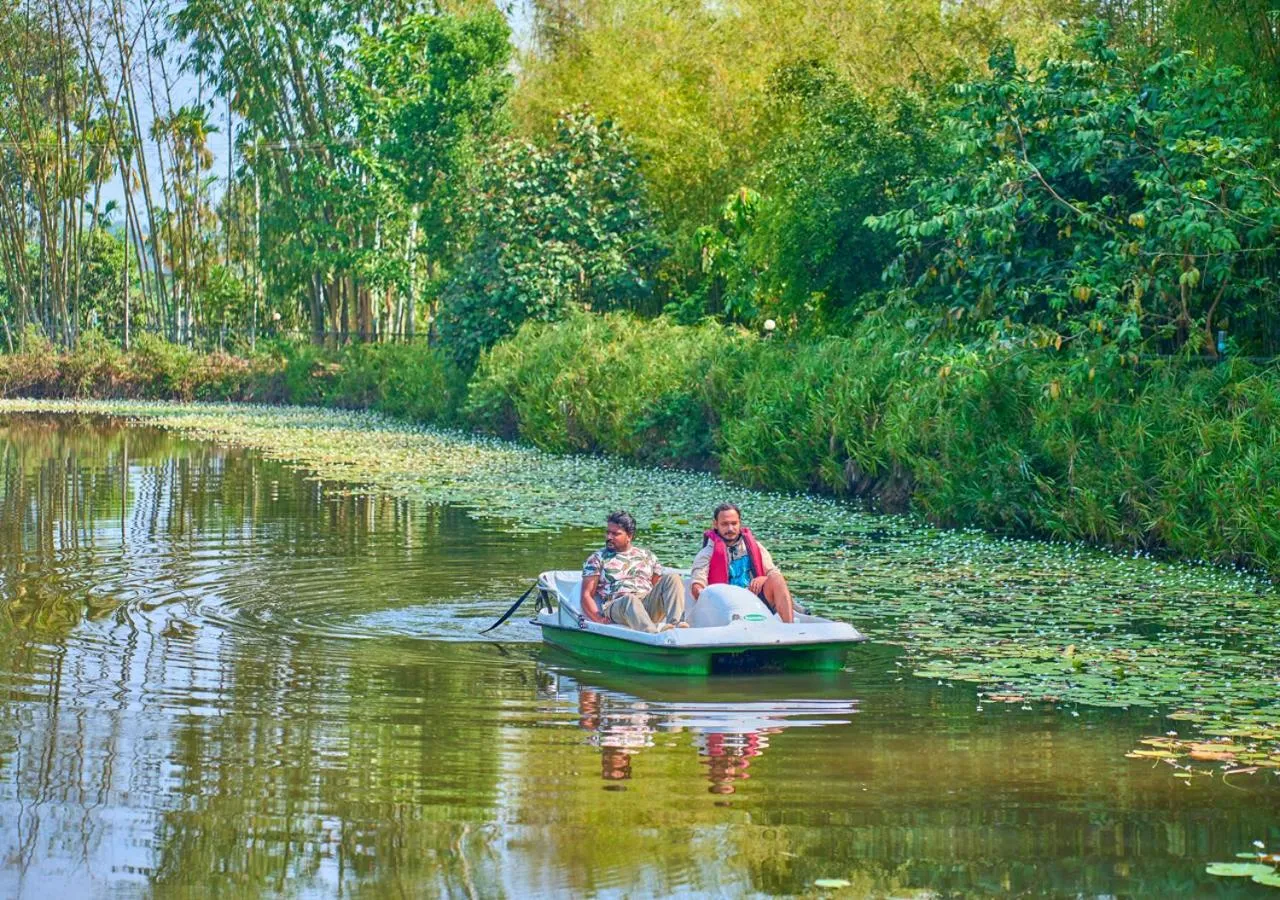 Evening entertainment in Niyatma Wayanad Pool Resort by VOYE HOMES - Inside Coffee Plantation