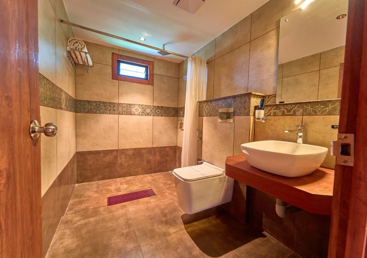 Shower in Niyatma Wayanad Pool Resort by VOYE HOMES - Inside Coffee Plantation