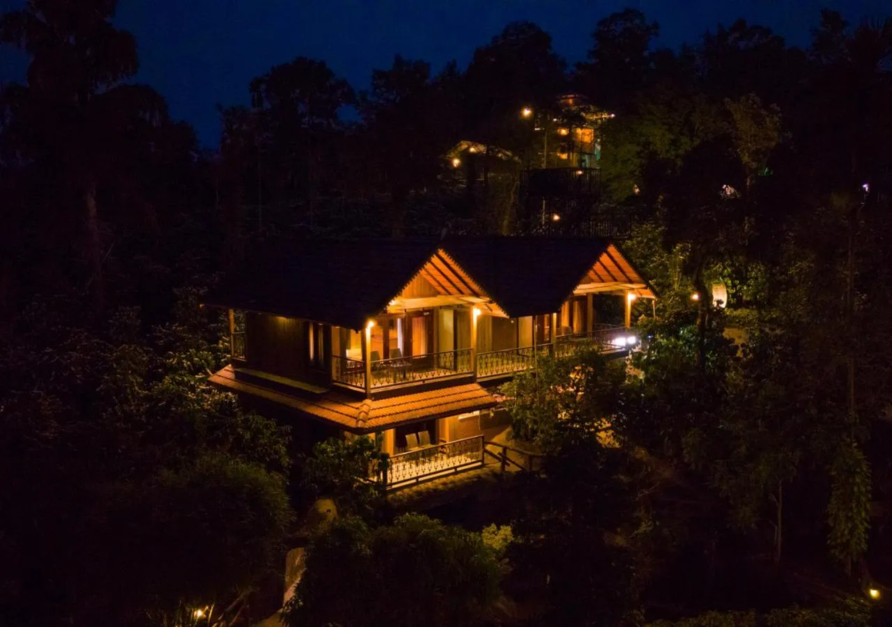 Property building in Niyatma Wayanad Pool Resort by VOYE HOMES - Inside Coffee Plantation