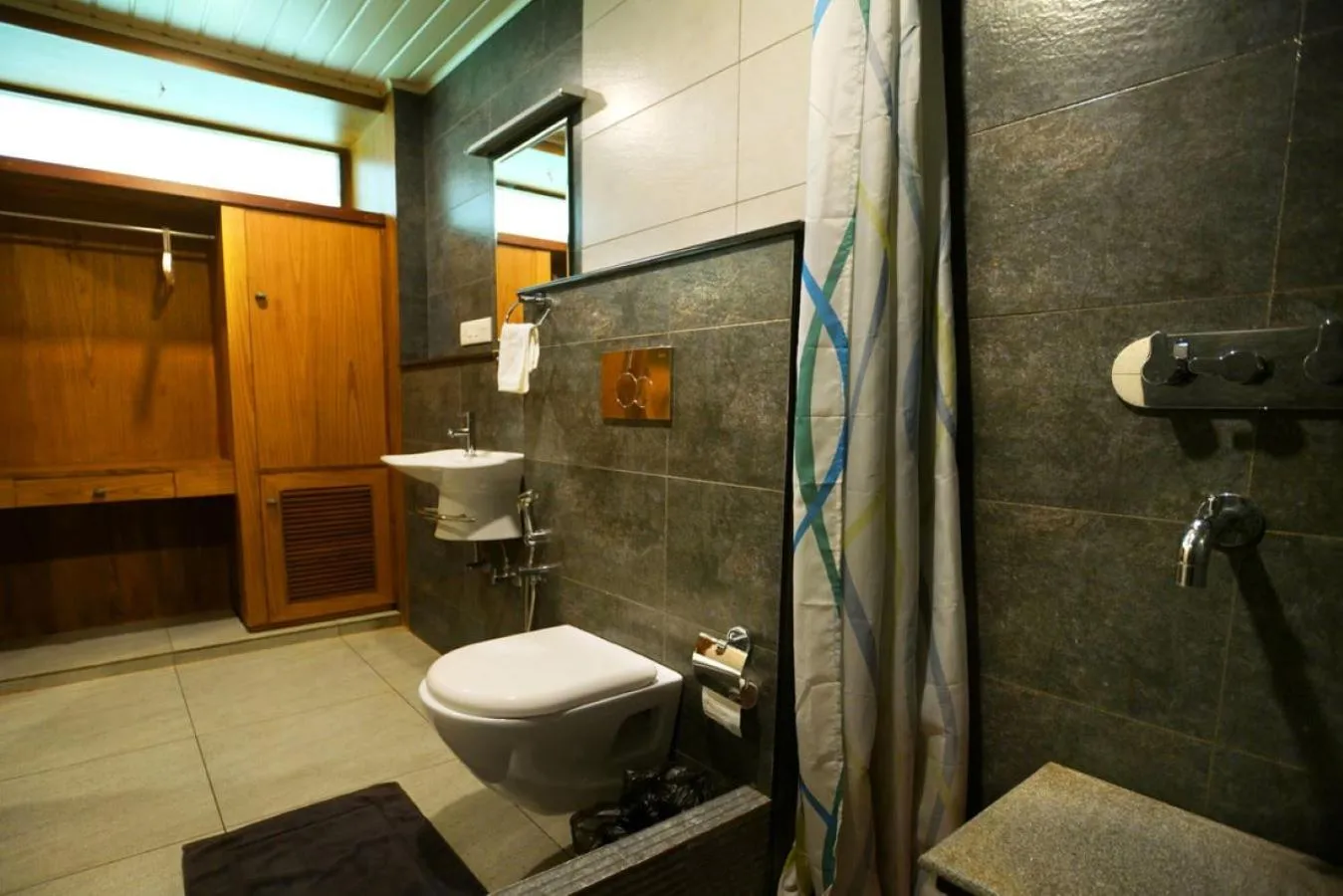 Bathroom in Niyatma Wayanad Pool Resort by VOYE HOMES - Inside Coffee Plantation
