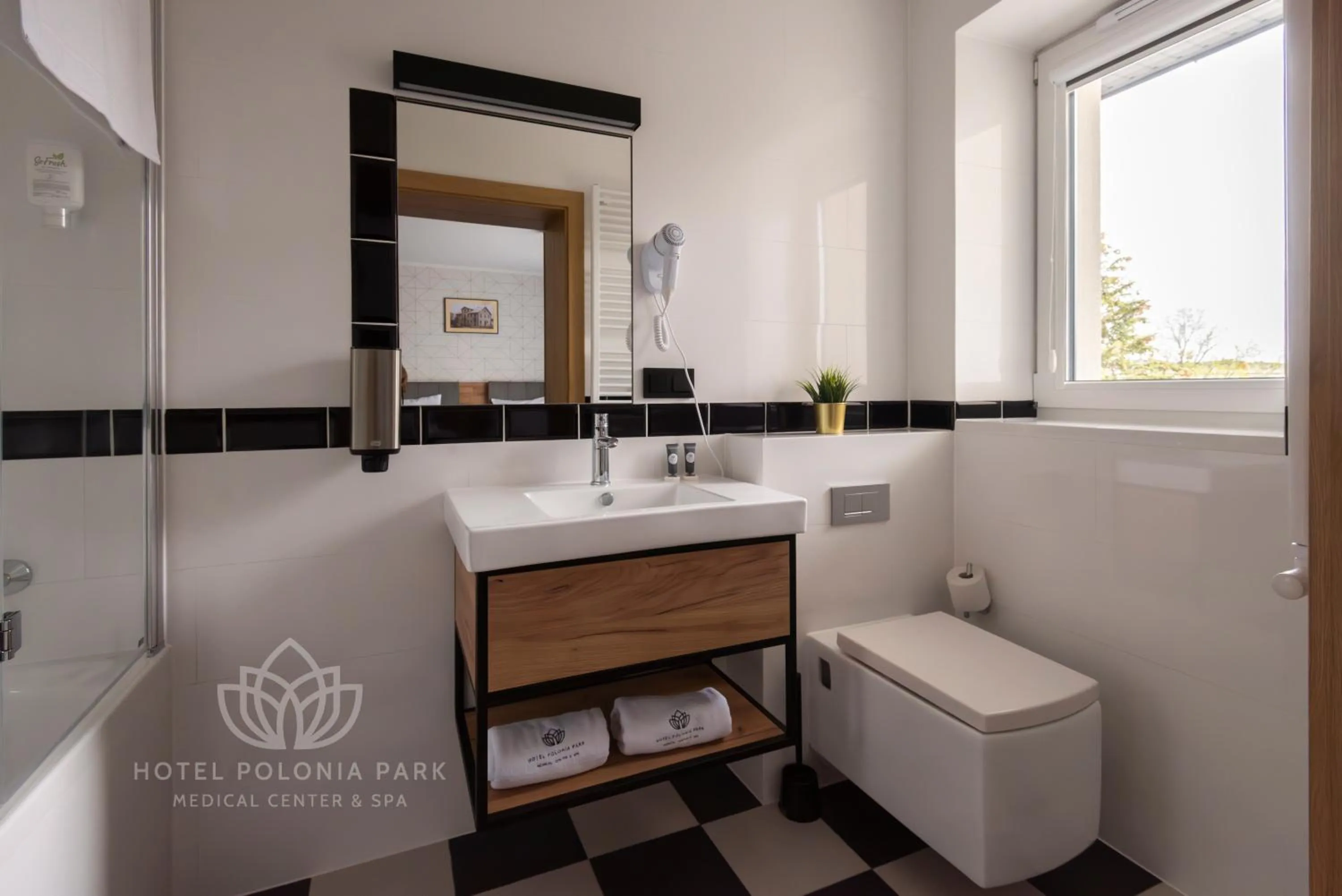 Toilet in Hotel Polonia PARK Medical Center & Spa