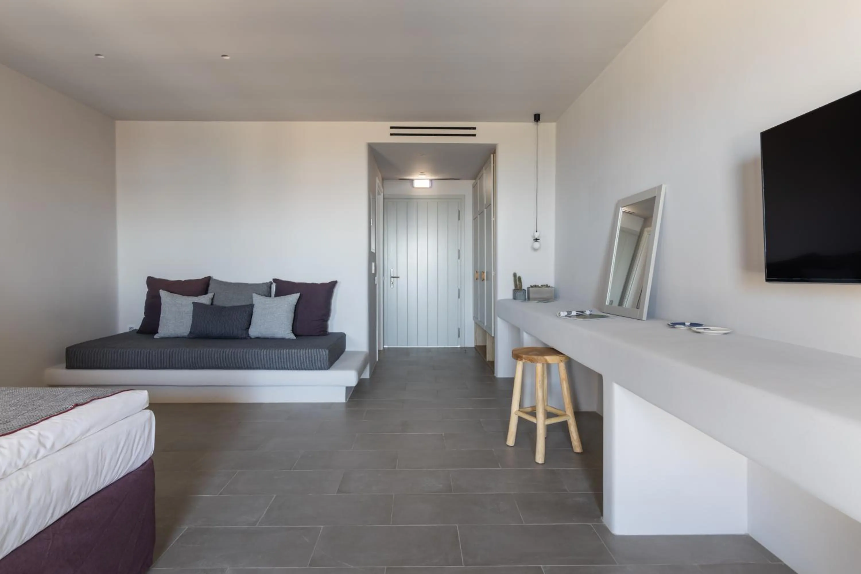 Seating area, Bed in Poseidon of Paros Hotel & Spa