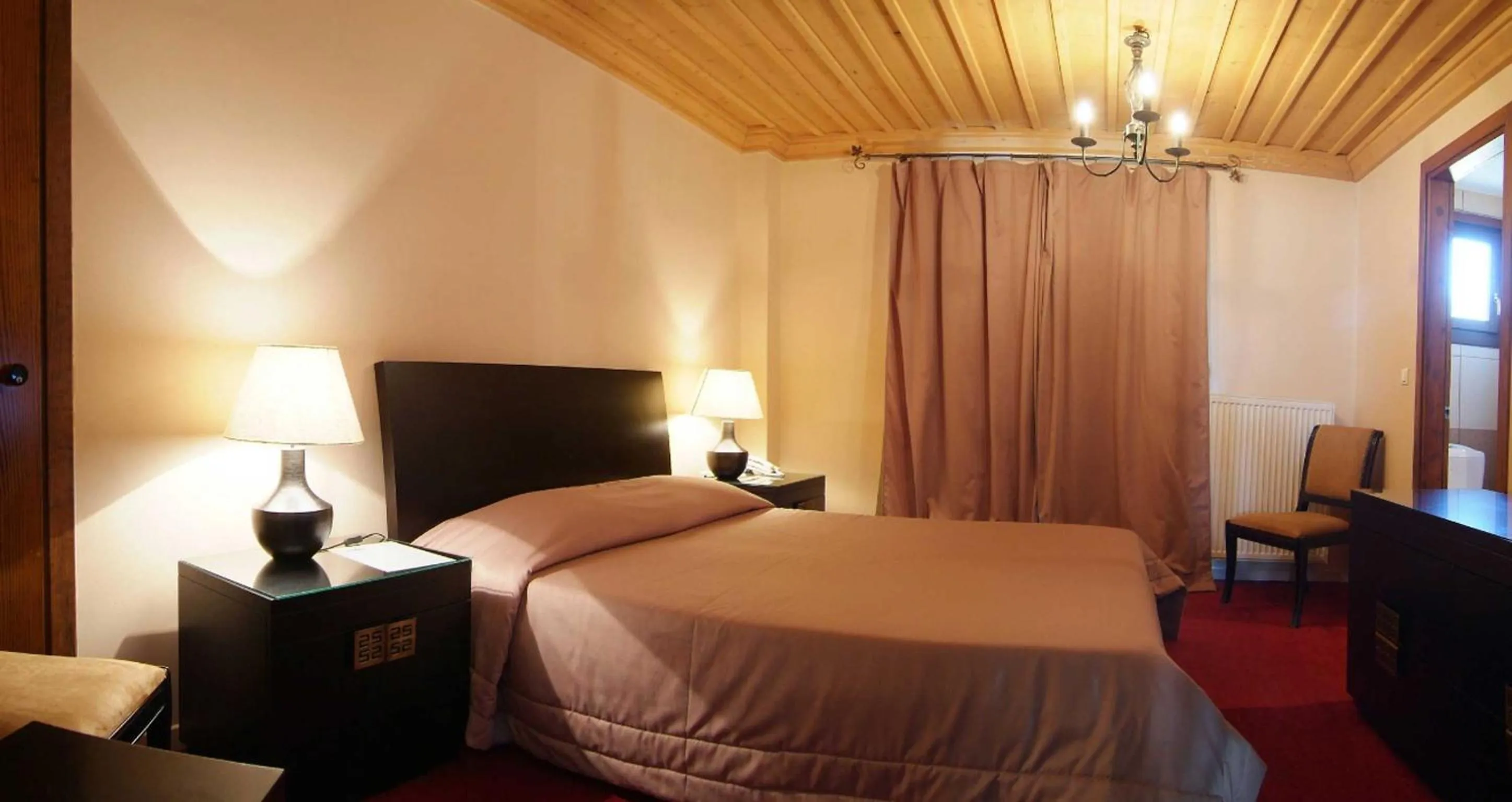 Photo of the whole room, Bed in Boutique Hotel Skamnos Arachova