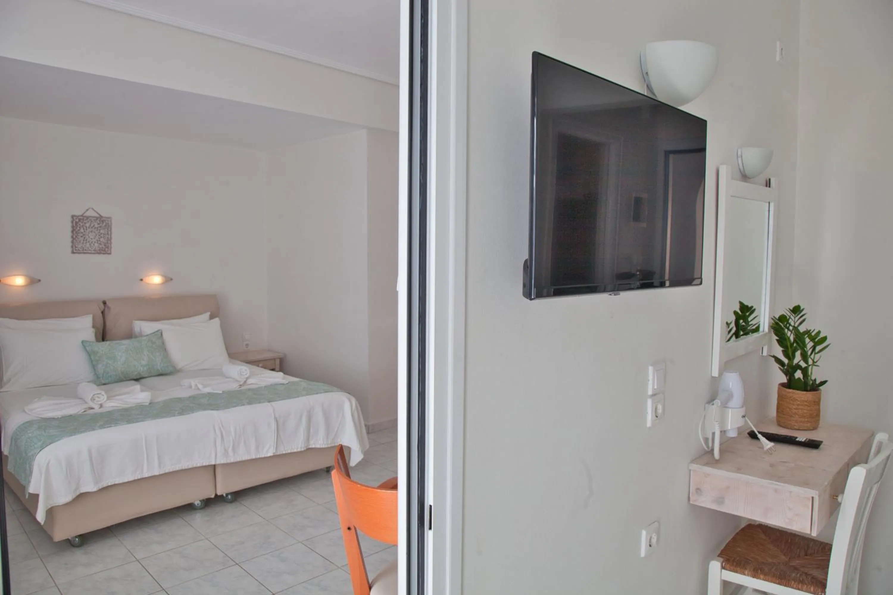 Photo of the whole room, Bed in The Milos