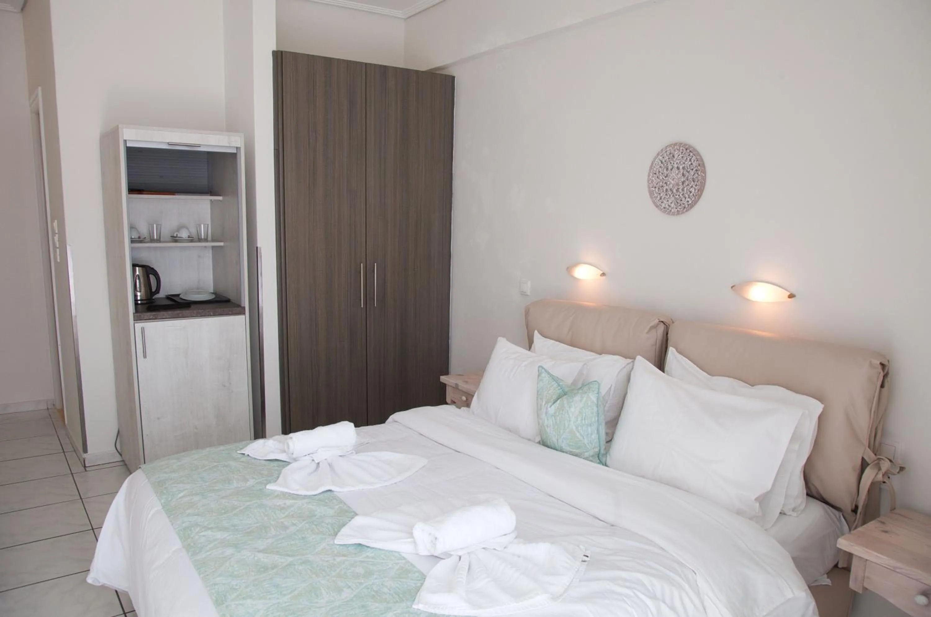 Photo of the whole room, Bed in The Milos