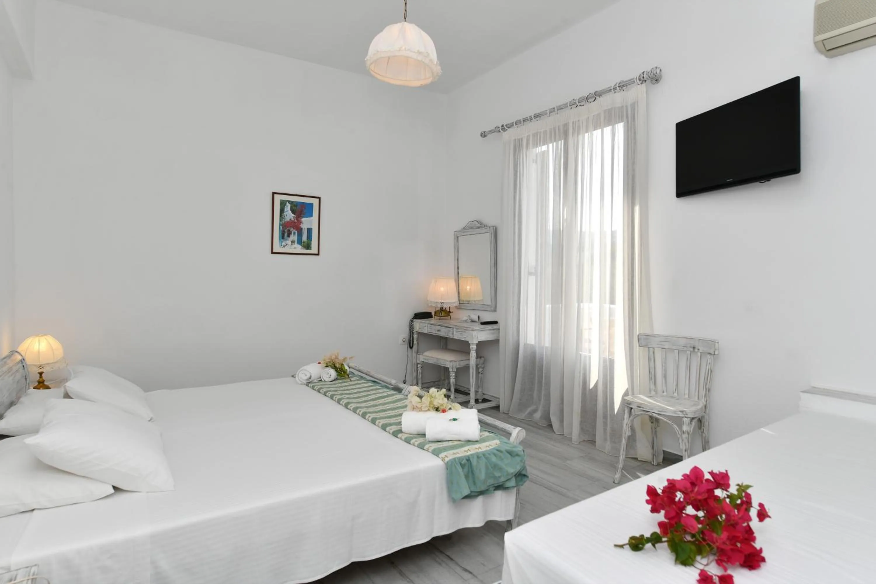 Bed in Hotel Swiss Home