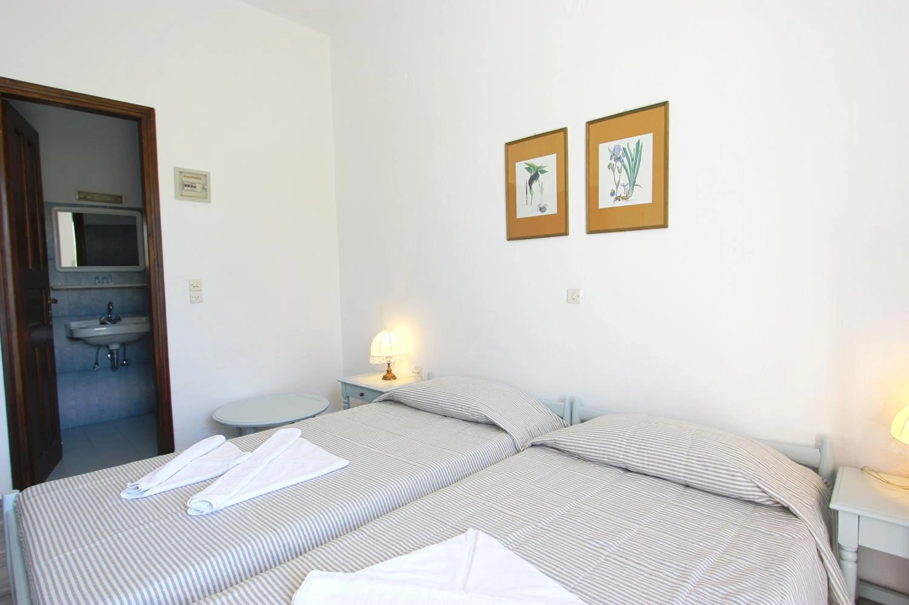 Bed in Hotel Swiss Home