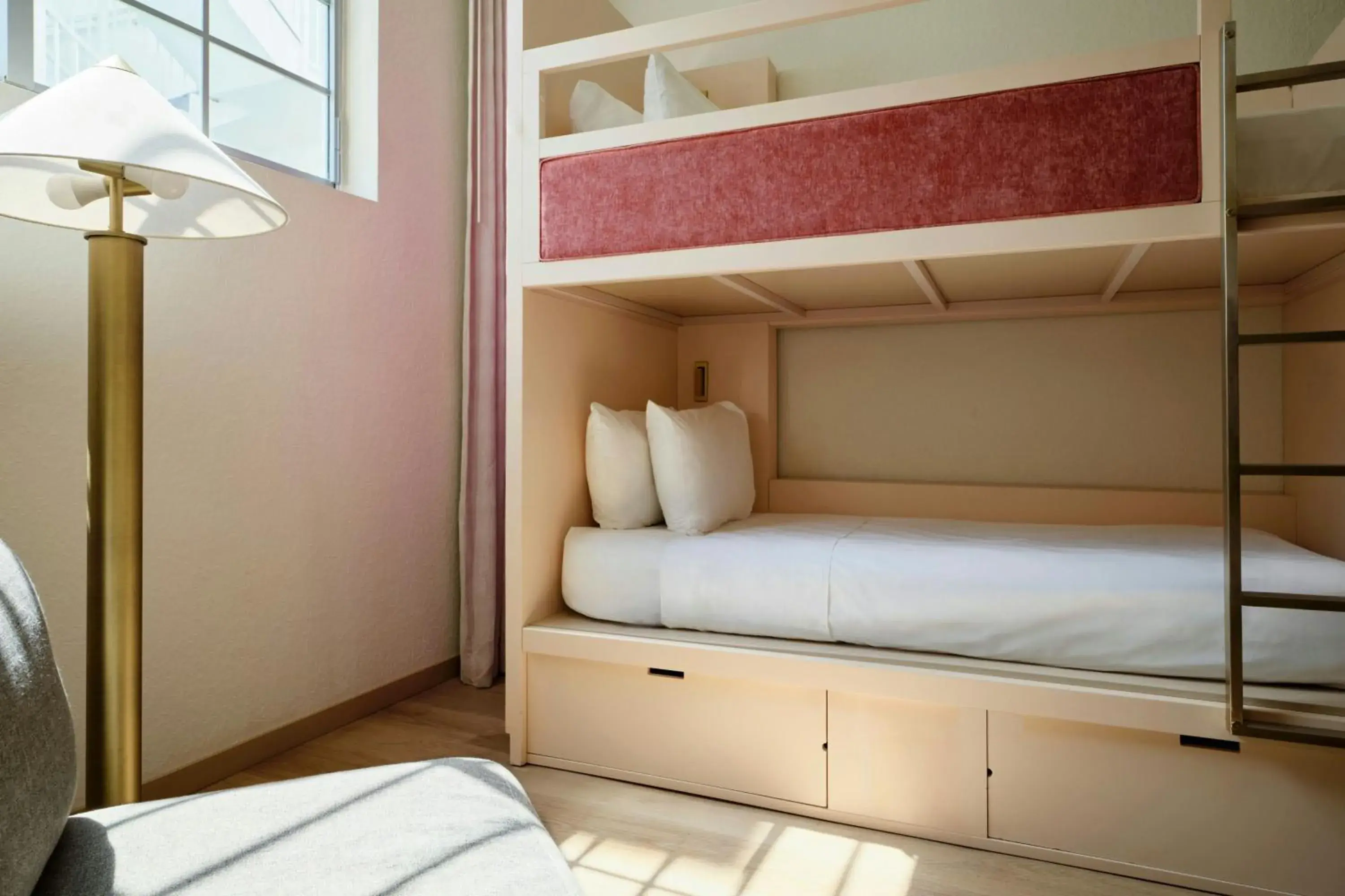 Triple Bunk Room with Three Twin Bunk Beds and Pool View in FOUND Hotels, Miami Beach, Series by Marriott Triple Bunk Room with Three Twin Bunk Beds and Pool View in FOUND Hotels, Miami Beach, Series by Marriott