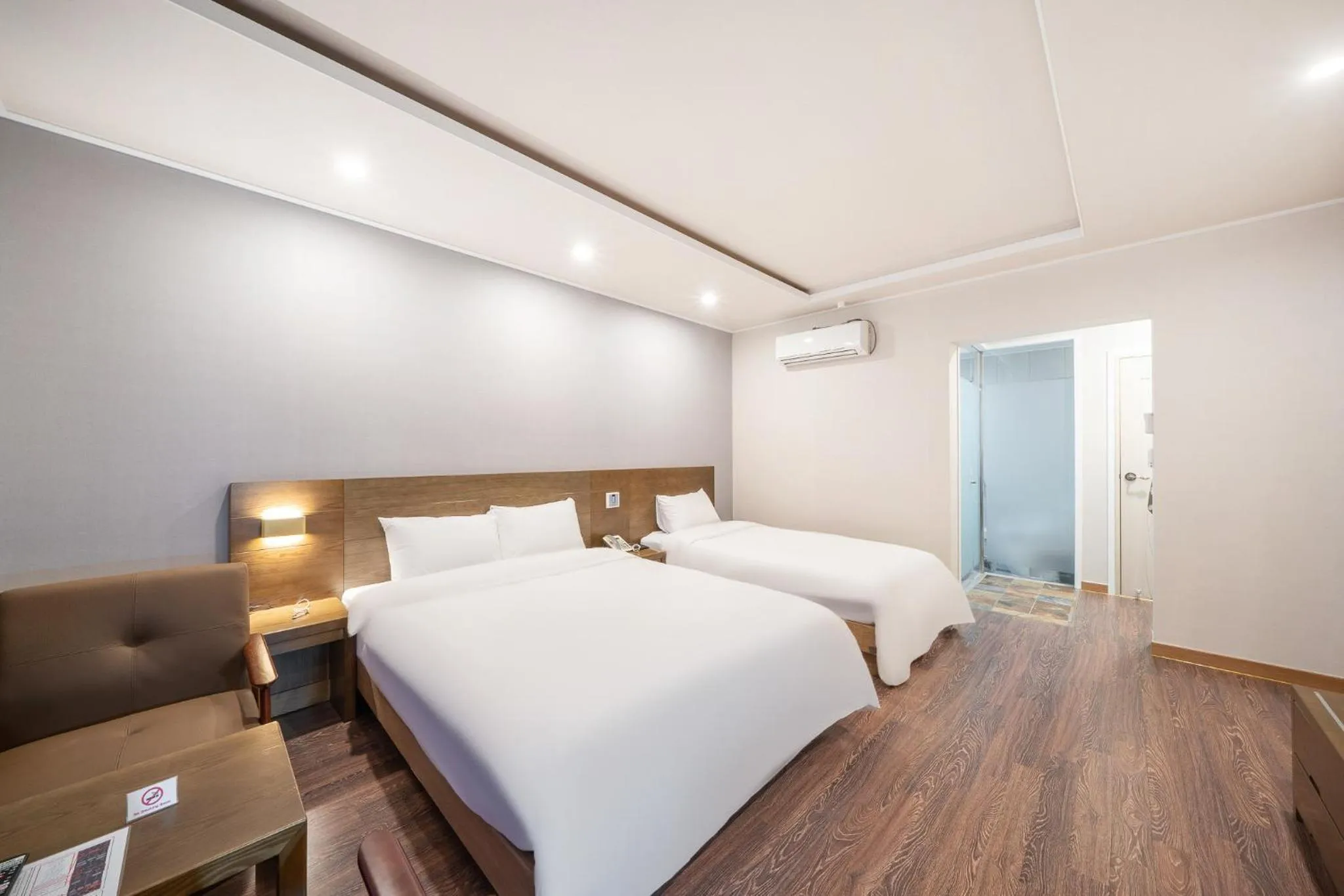 Bed in The 7 Business Hotel