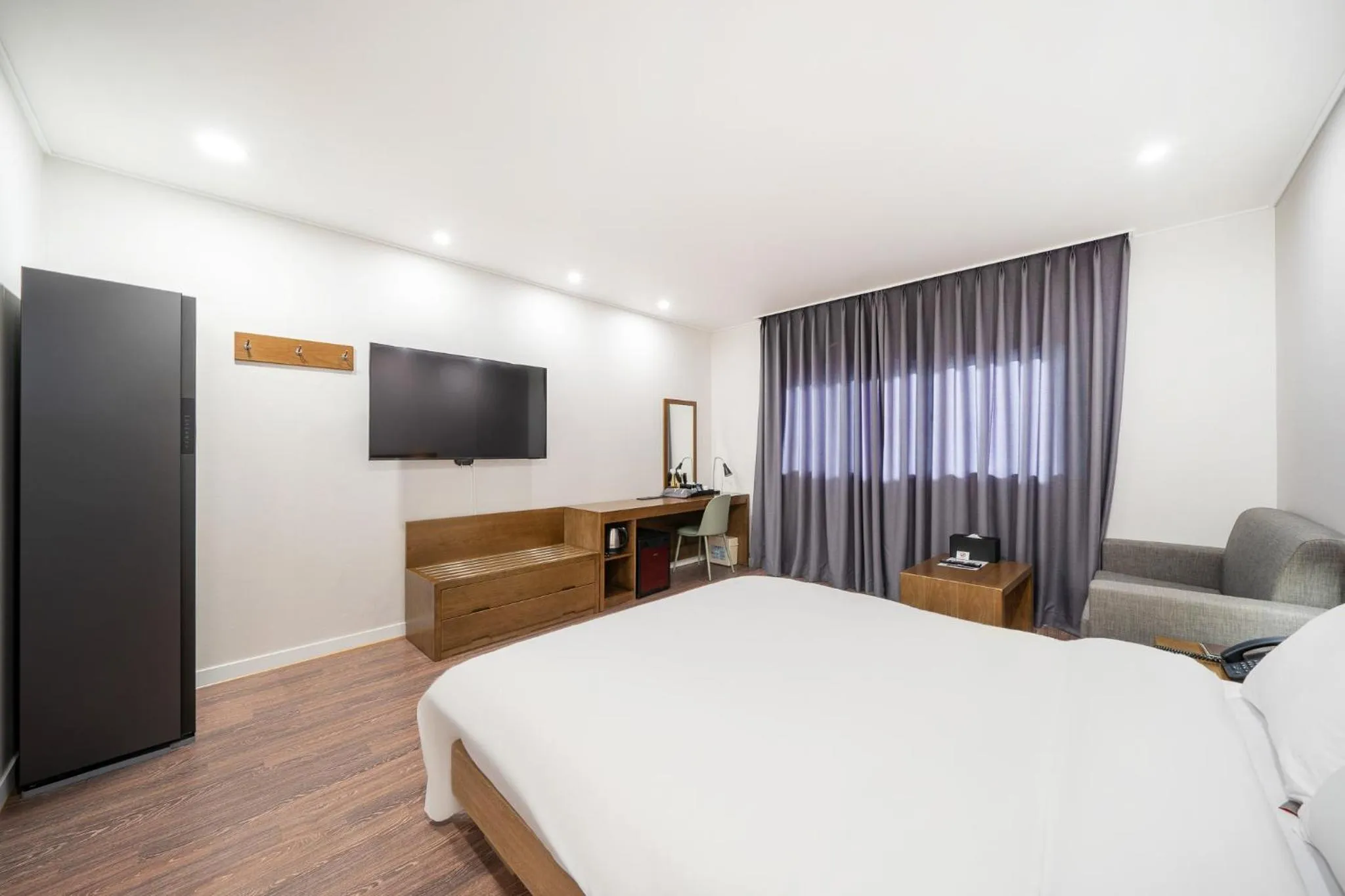 Bed in The 7 Business Hotel