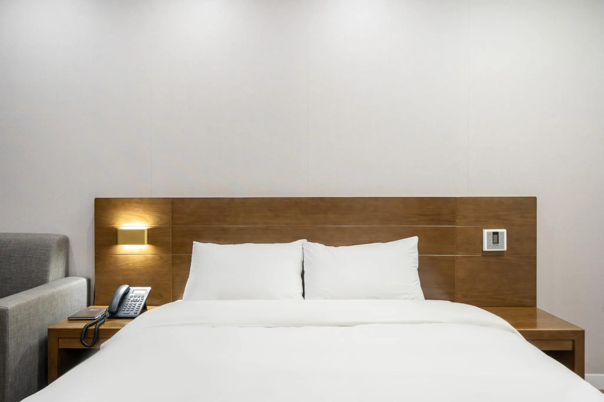 Bed in The 7 Business Hotel