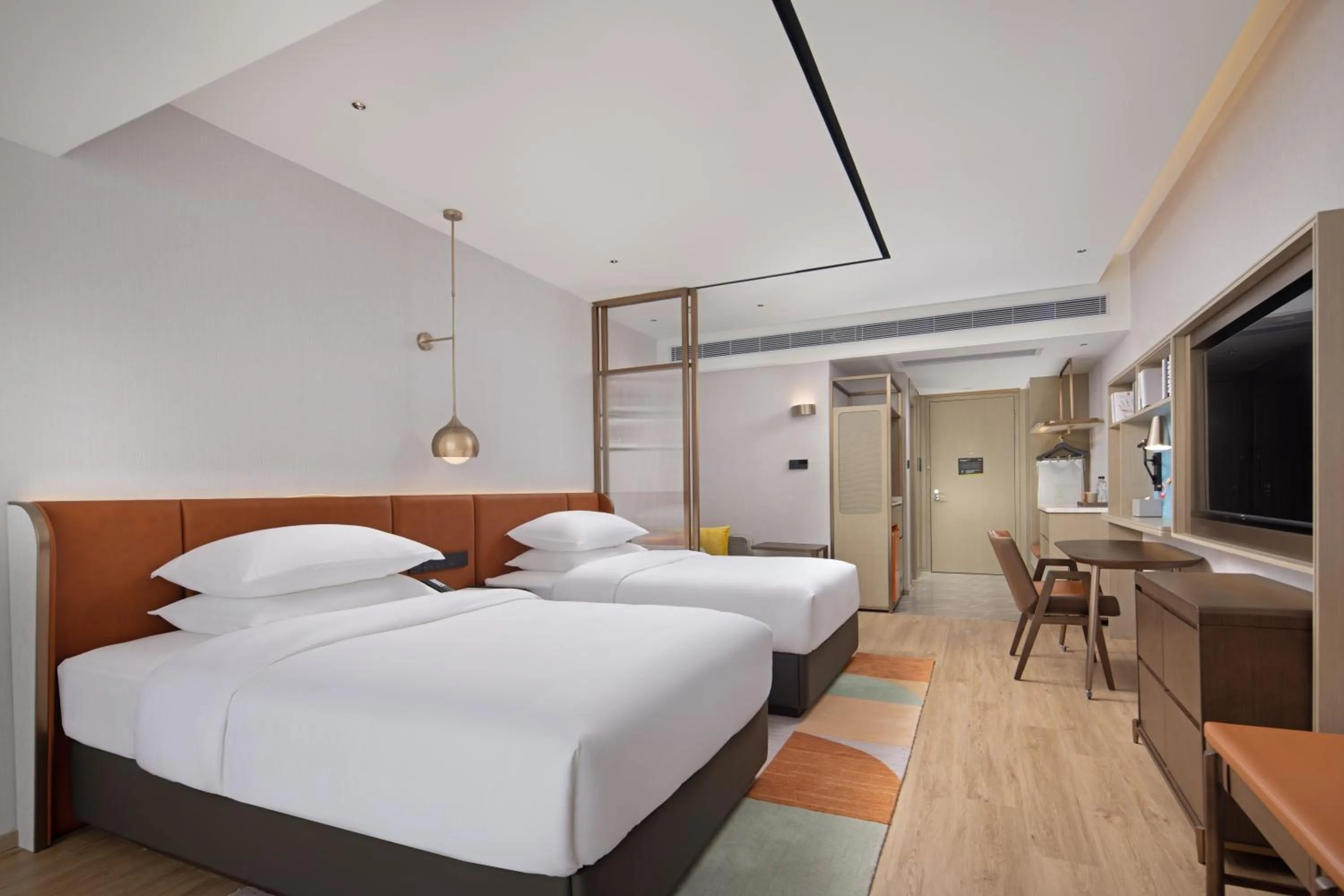 Bed in Home2 Suites by Hilton Nanning