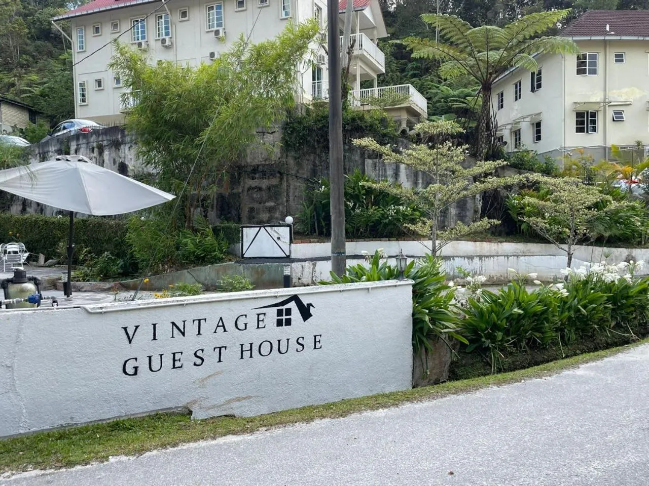Property logo or sign in Vintage Guesthouse