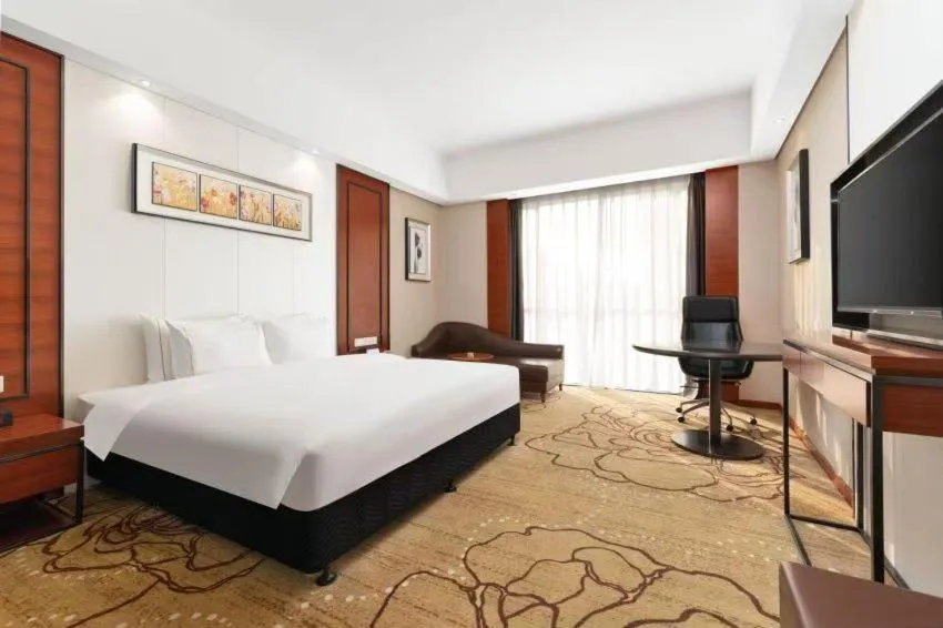 Bed in 深圳国际会展中心凯嘉酒店-Shenzhen Kaijia Hotel-Shenzhen-World