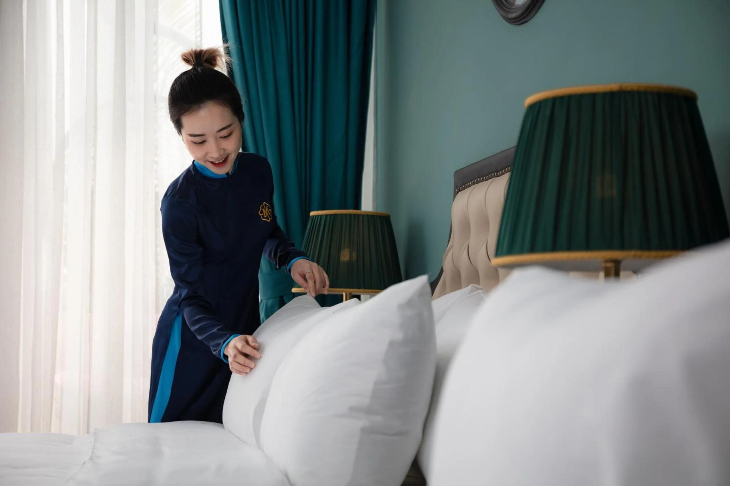 Bed in Madelise Palace Hotel & Travel