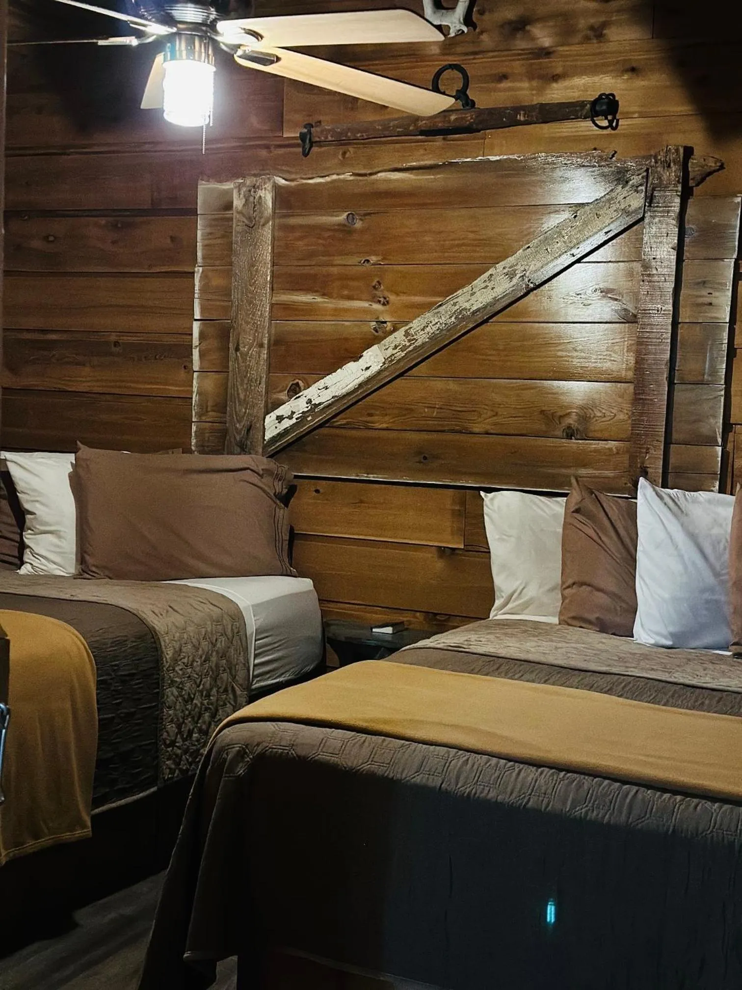 Bed in Country Cabins Hotel