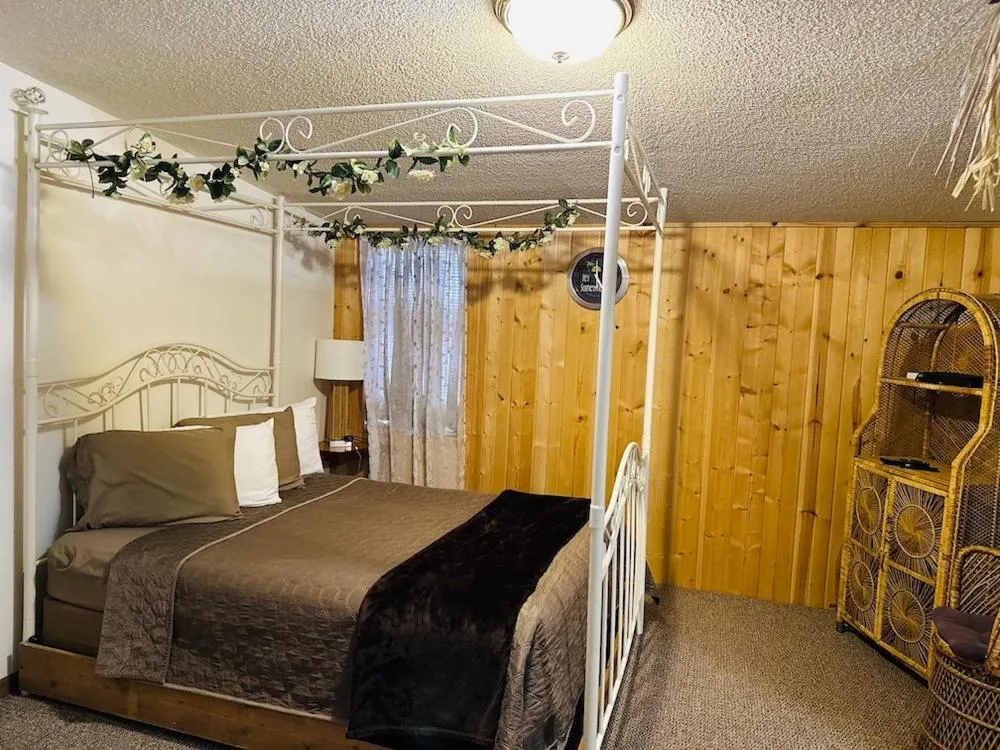 Bed in Country Cabins Hotel