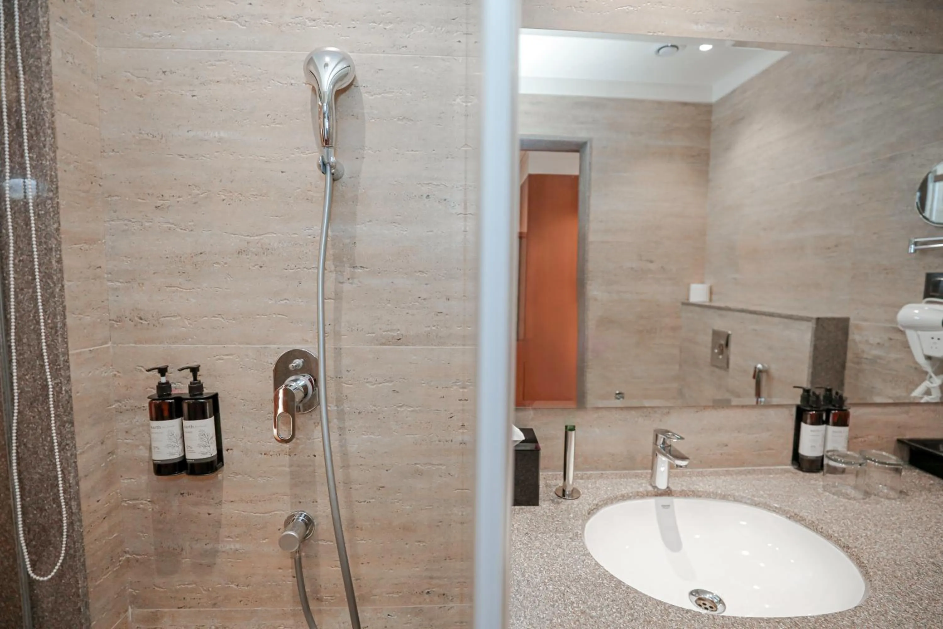 Shower in Regenta Place Bhopal by Royal Orchid Hotels Limited
