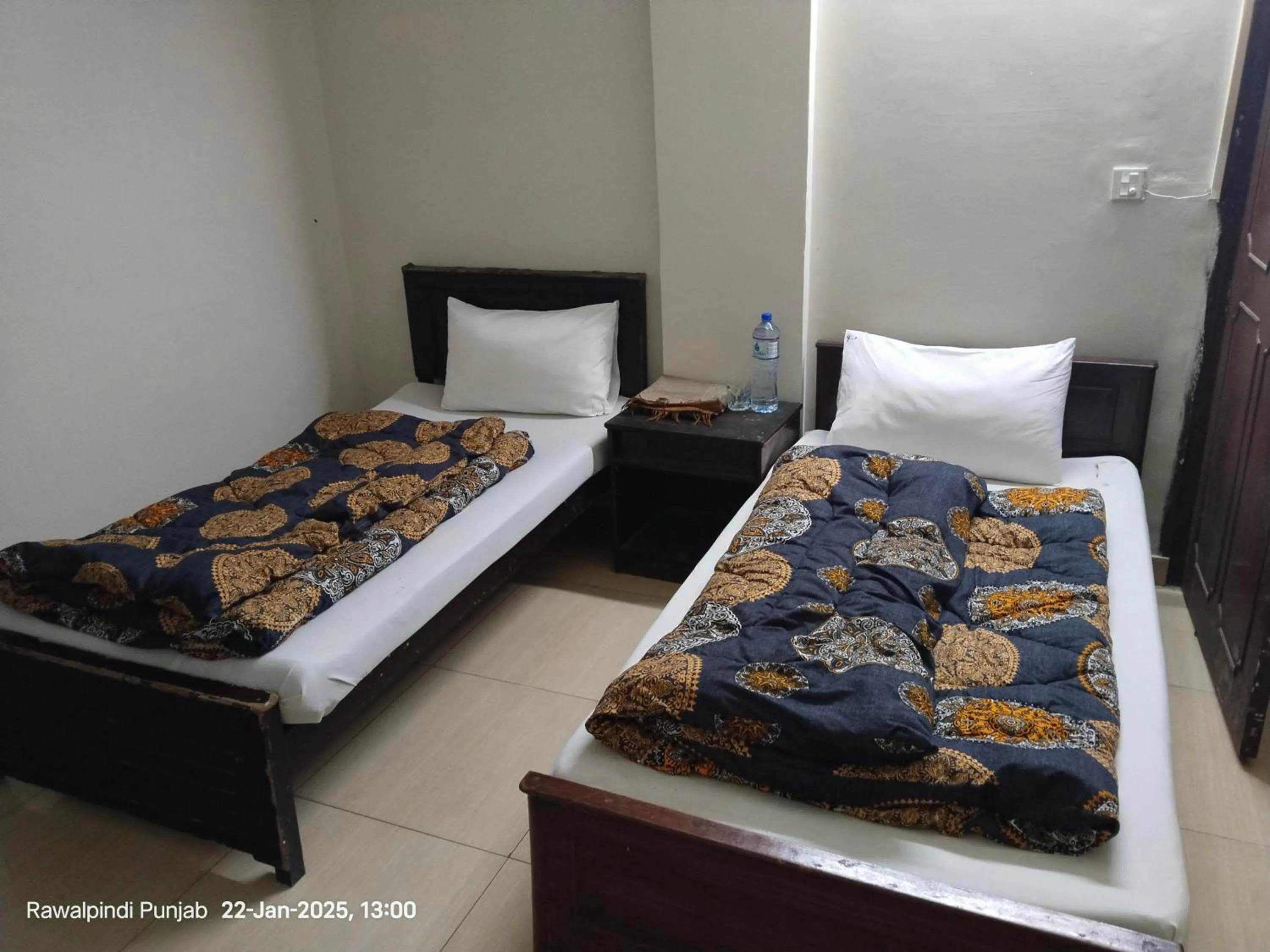 Bed in Al Sakhawat Hotel