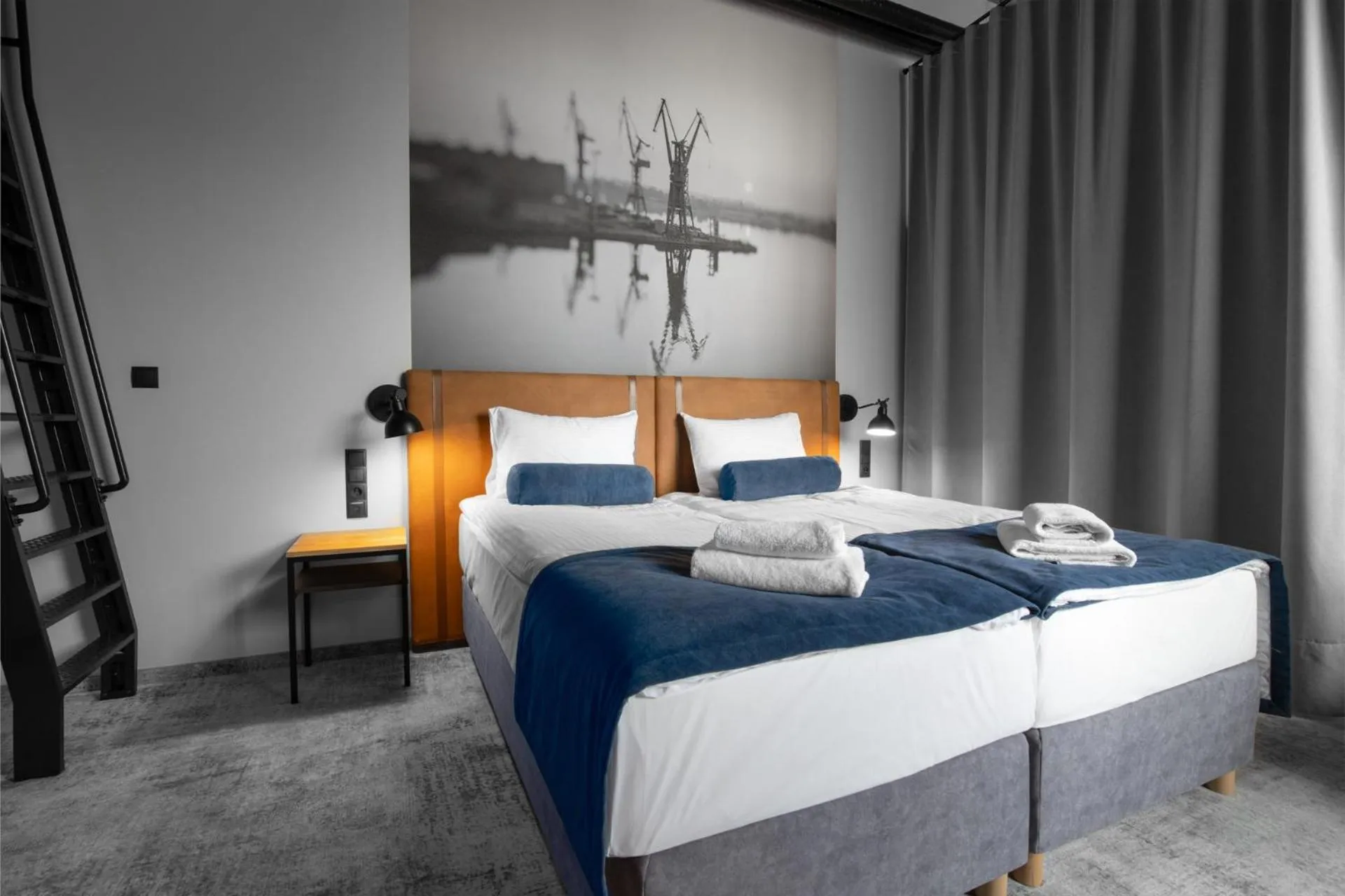 Bed in MONTOWNIA Lofts & Experience