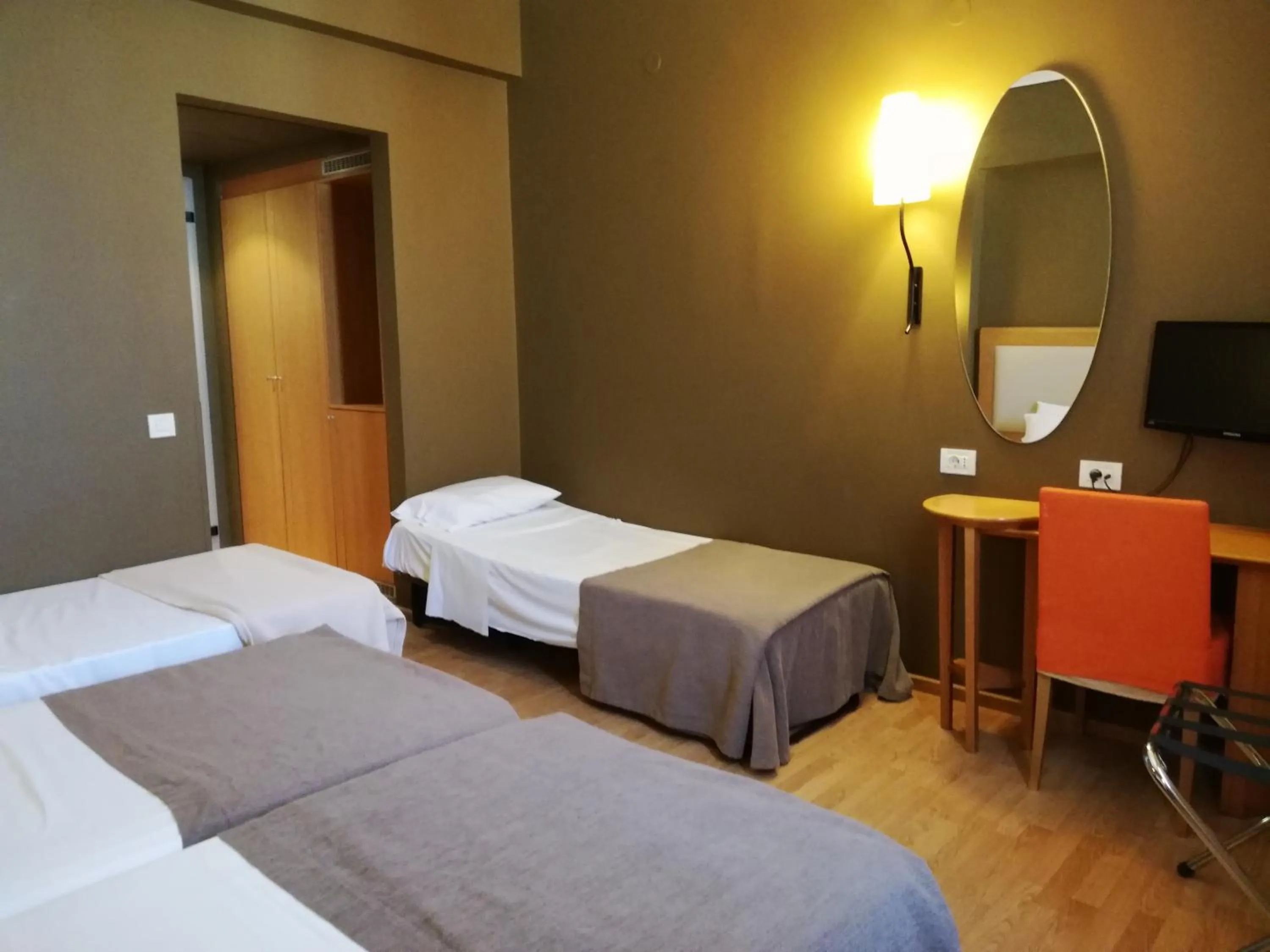 Bed in Olympic Hotel